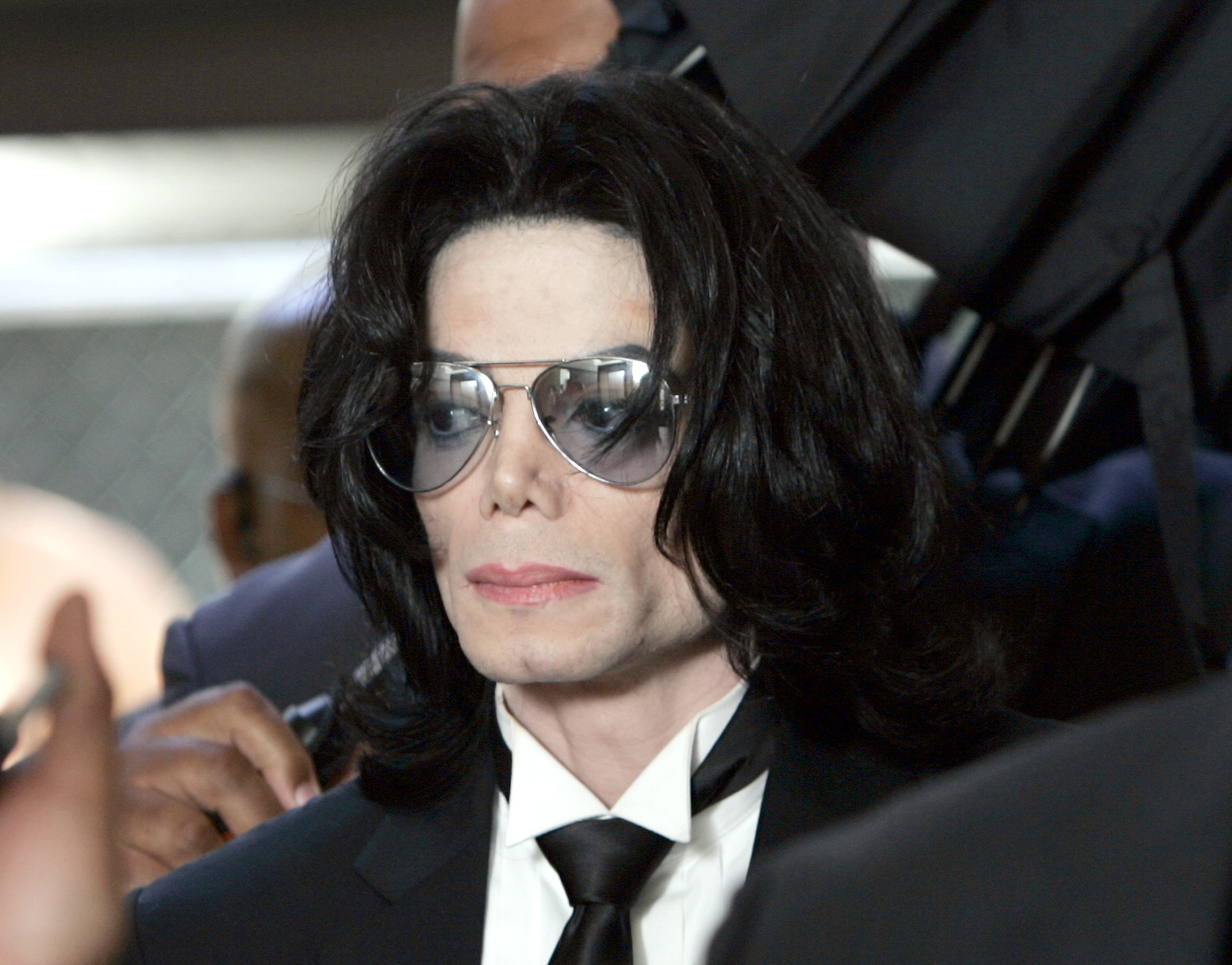 Michael Jackson prepares to enter the Santa Barbara County Superior Court to hear the verdict in his child molestation case on June 13, 2005, in Santa Maria, California | Source: Getty Images