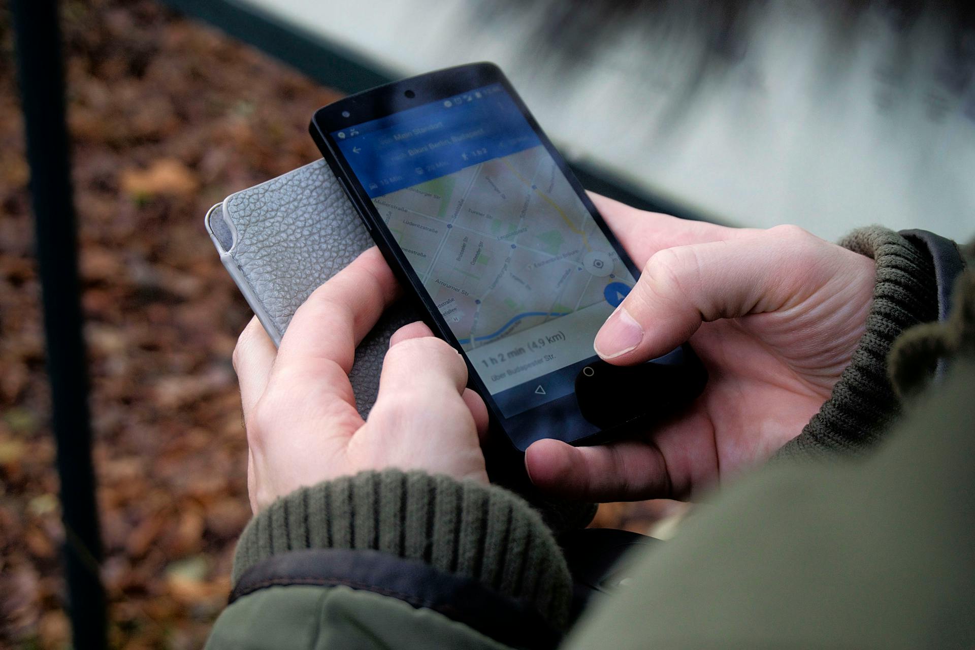 A person looking at a map on their phone | Source: Pexels