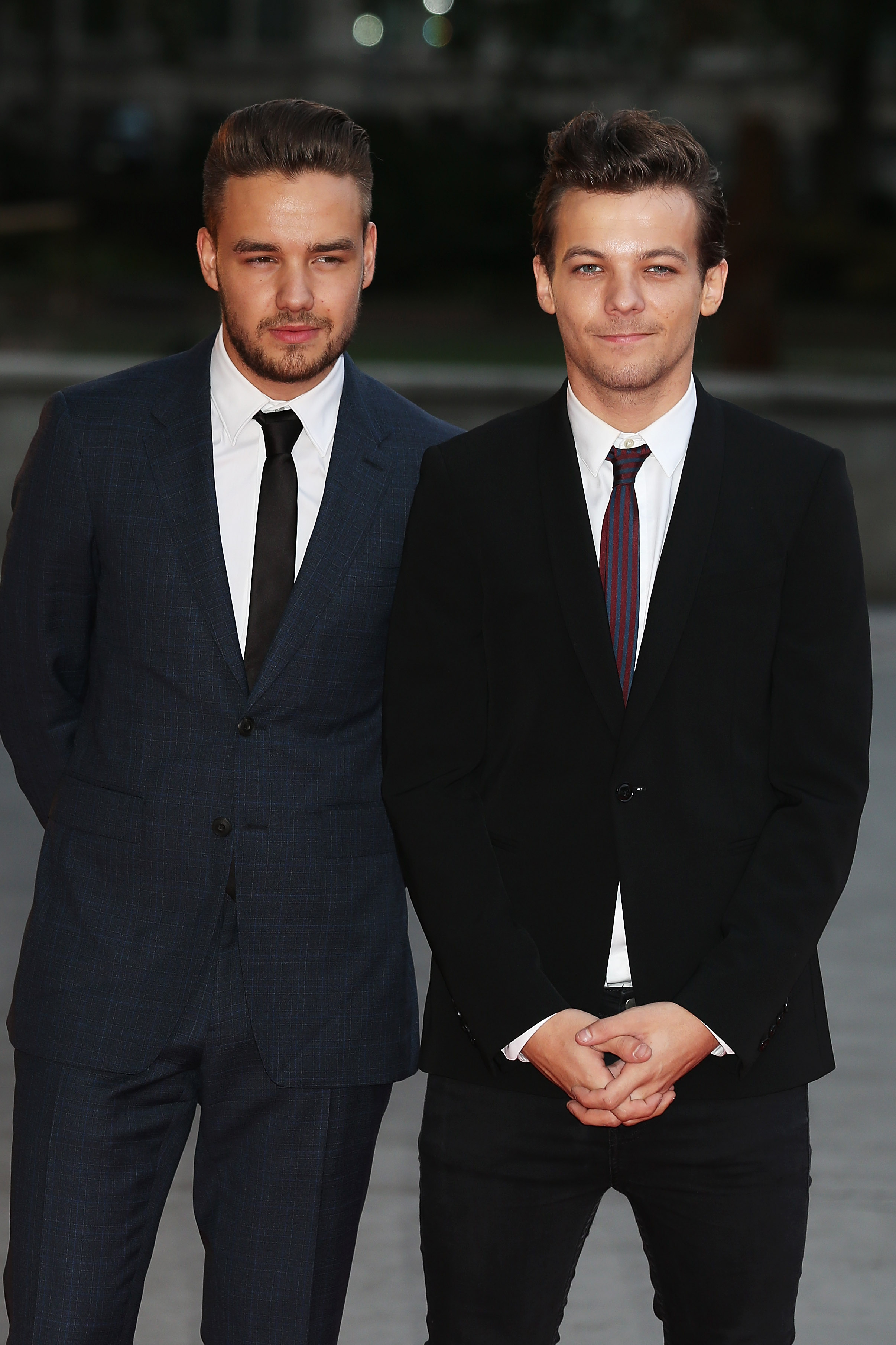 Louis Tomlinson and Liam Payne attend the Believe in Magic Cinderella Ball in London on August 10, 2015 | Source: Getty Images