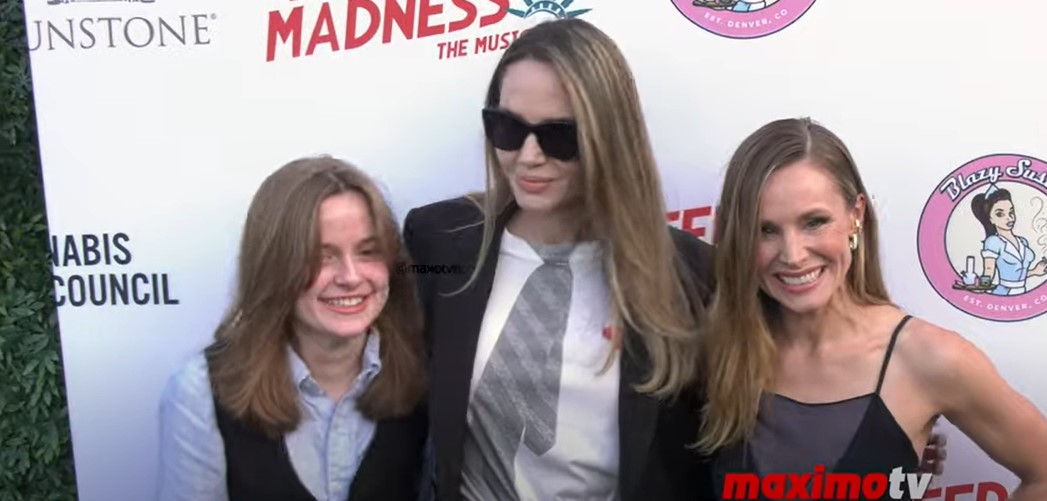 Vivienne Jolie-Pitt, Angelina Jolie, and Kristen Bell at the opening night performance of "Reefer Madness: The Musical" at The Whitley on May 30, 2024, in Los Angeles, California | Source: YouTube/MaximoTV