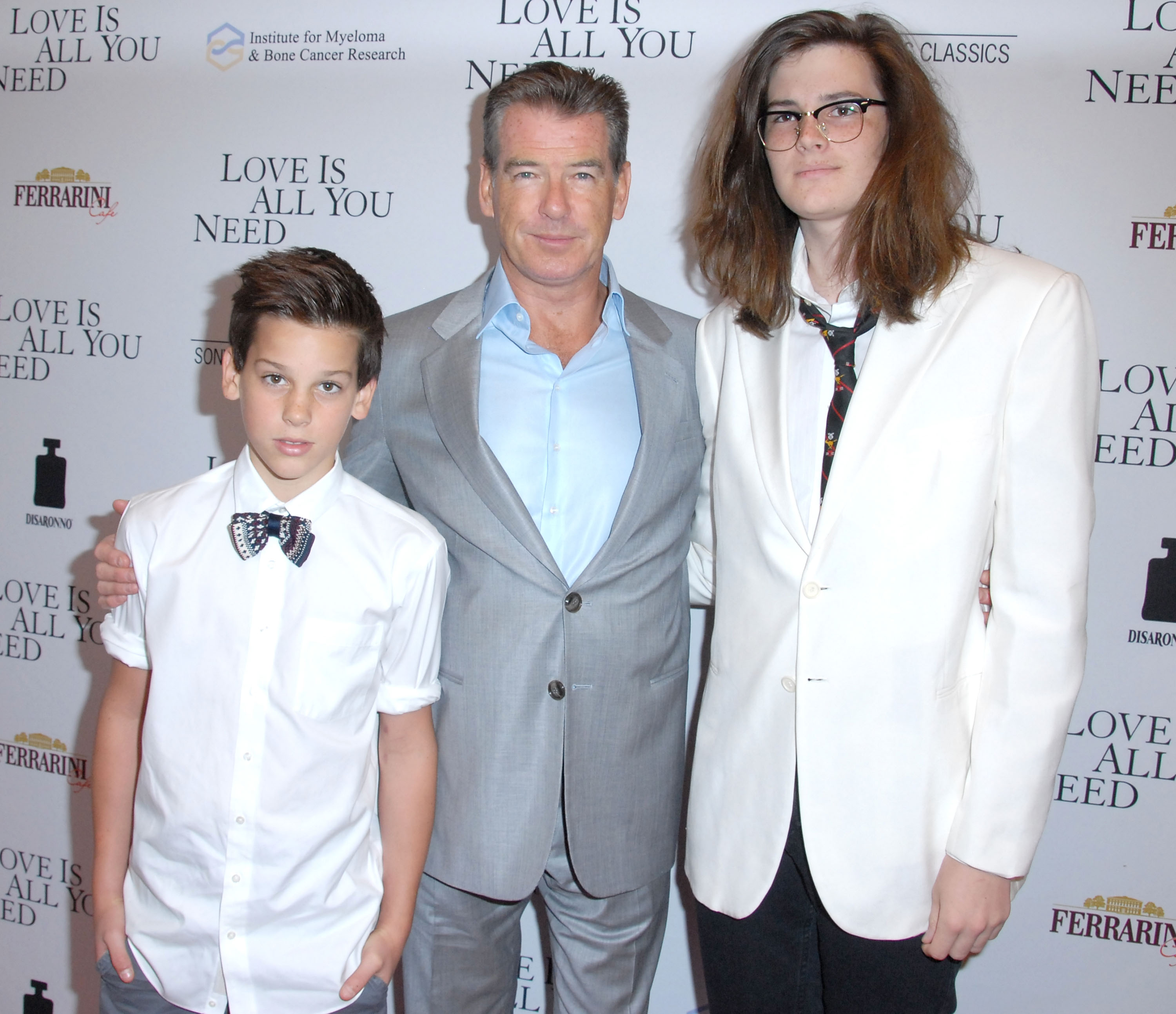 Pierce Brosnan with his sons Paris Brosnan and Dylan Brosnan at the premiere of "Love Is All You Need" on April 25, 2013, in Hollywood, California | Source: Getty Images