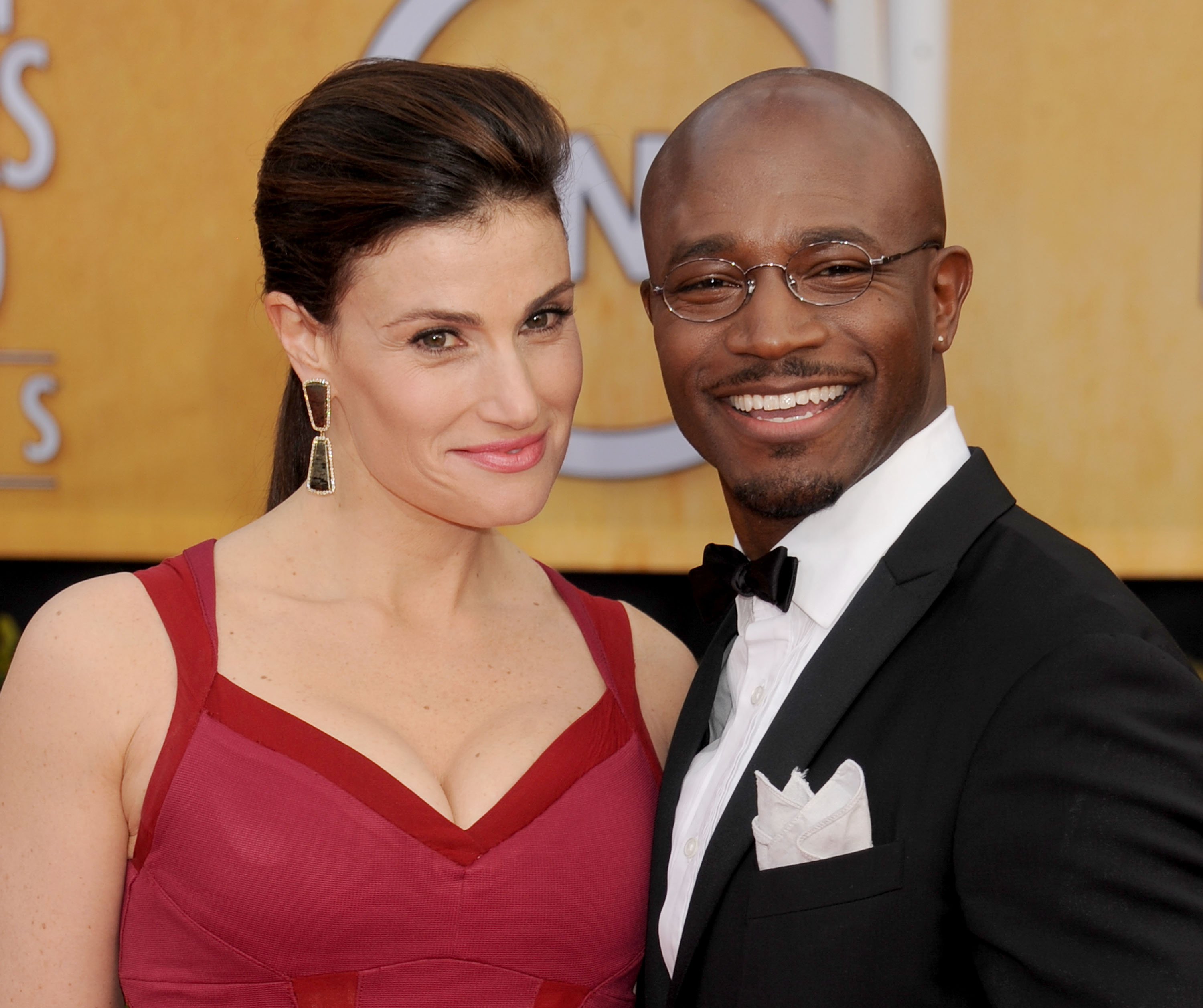 Actors Idina Menzel and Taye Diggs pose as they arrive at the 19th Annual Screen Actors Guild Awards on January 27, 2013 in Los Angeles | Source: Getty Images