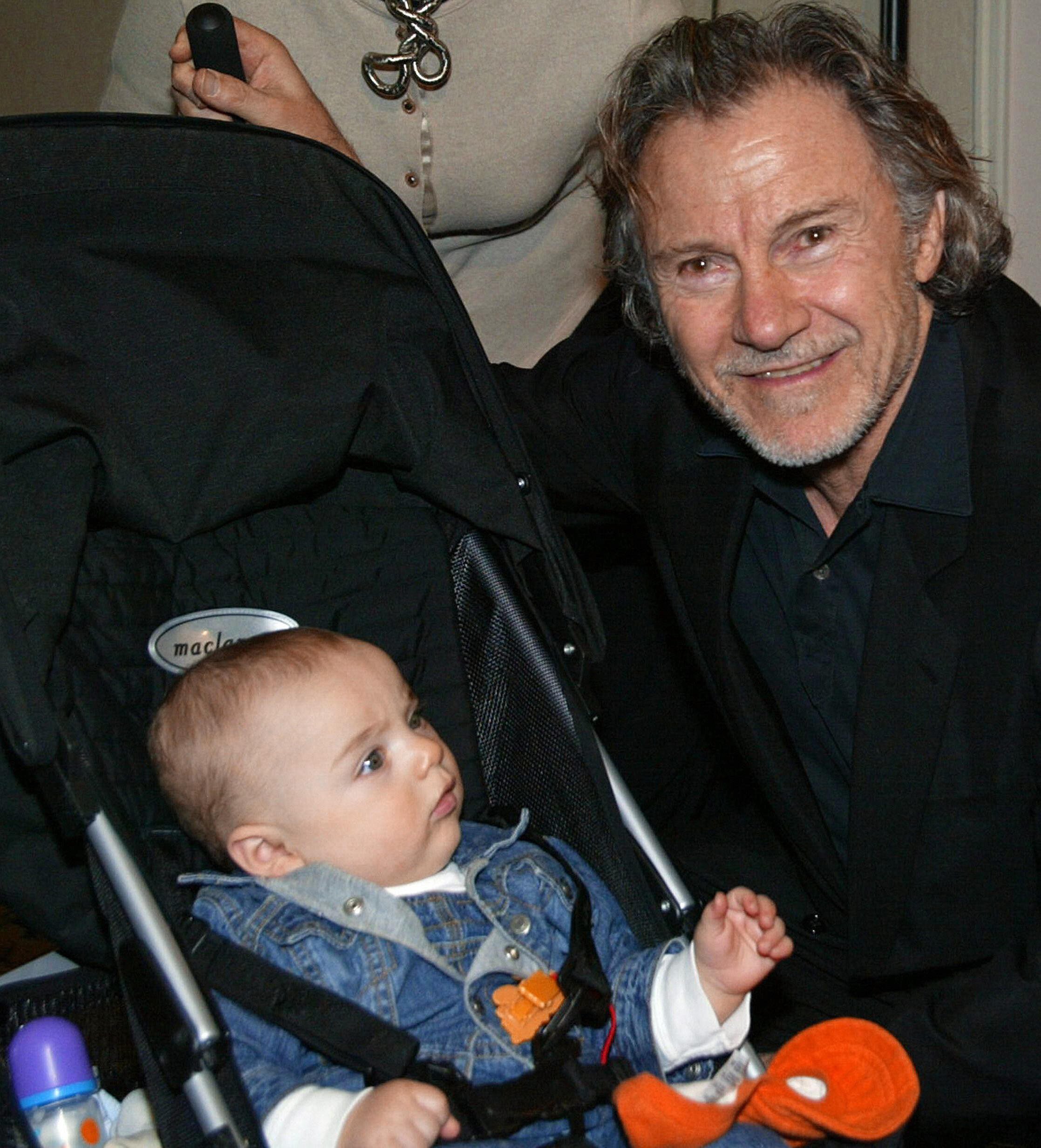 US actor Harvey Keitel poses with his son Roman before a press conference in an Istanbul hotel 15 April 2005. | Source: Getty Images