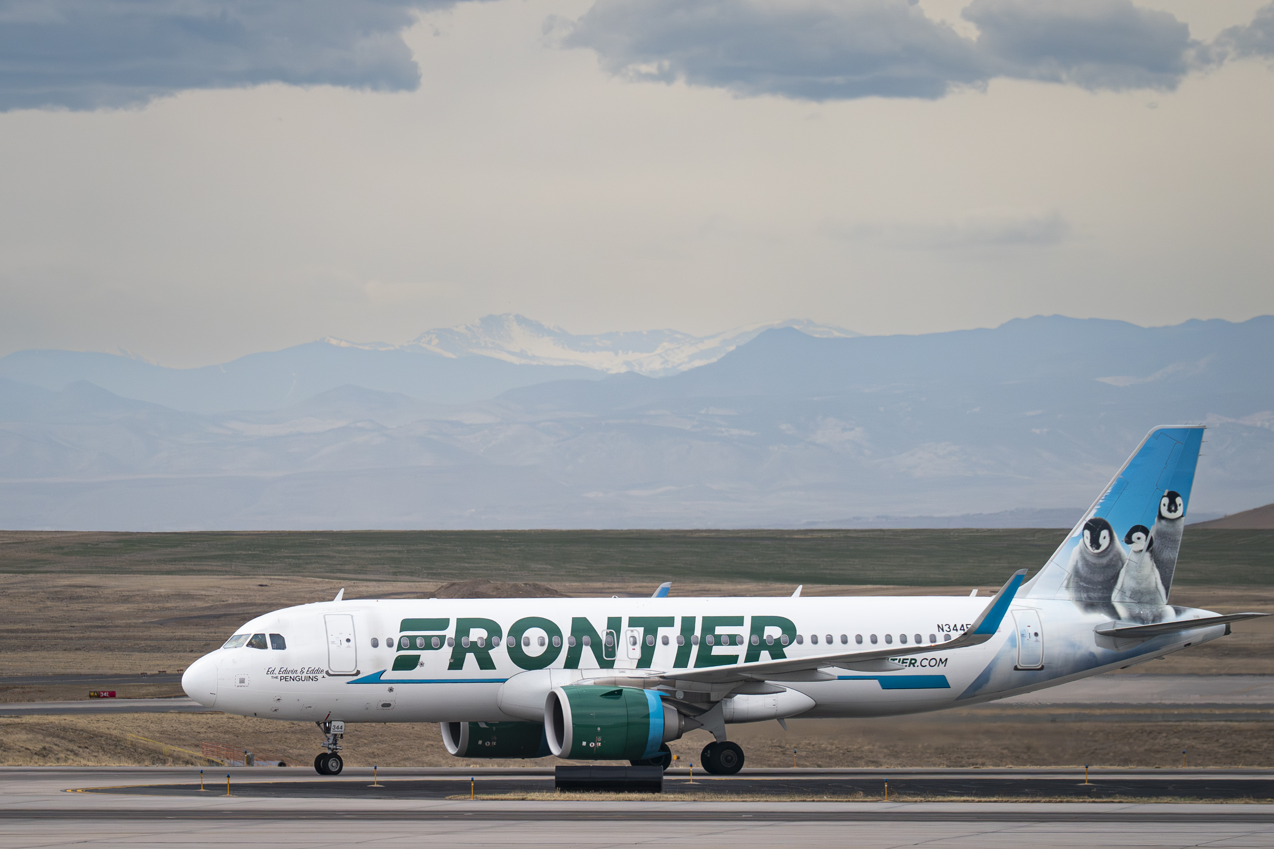 A Frontier Airlines Airbus A320neo plane taxis to a gate at Denver International Airport on March 23, 2026, in Denver, Colorado | Source: Getty Images