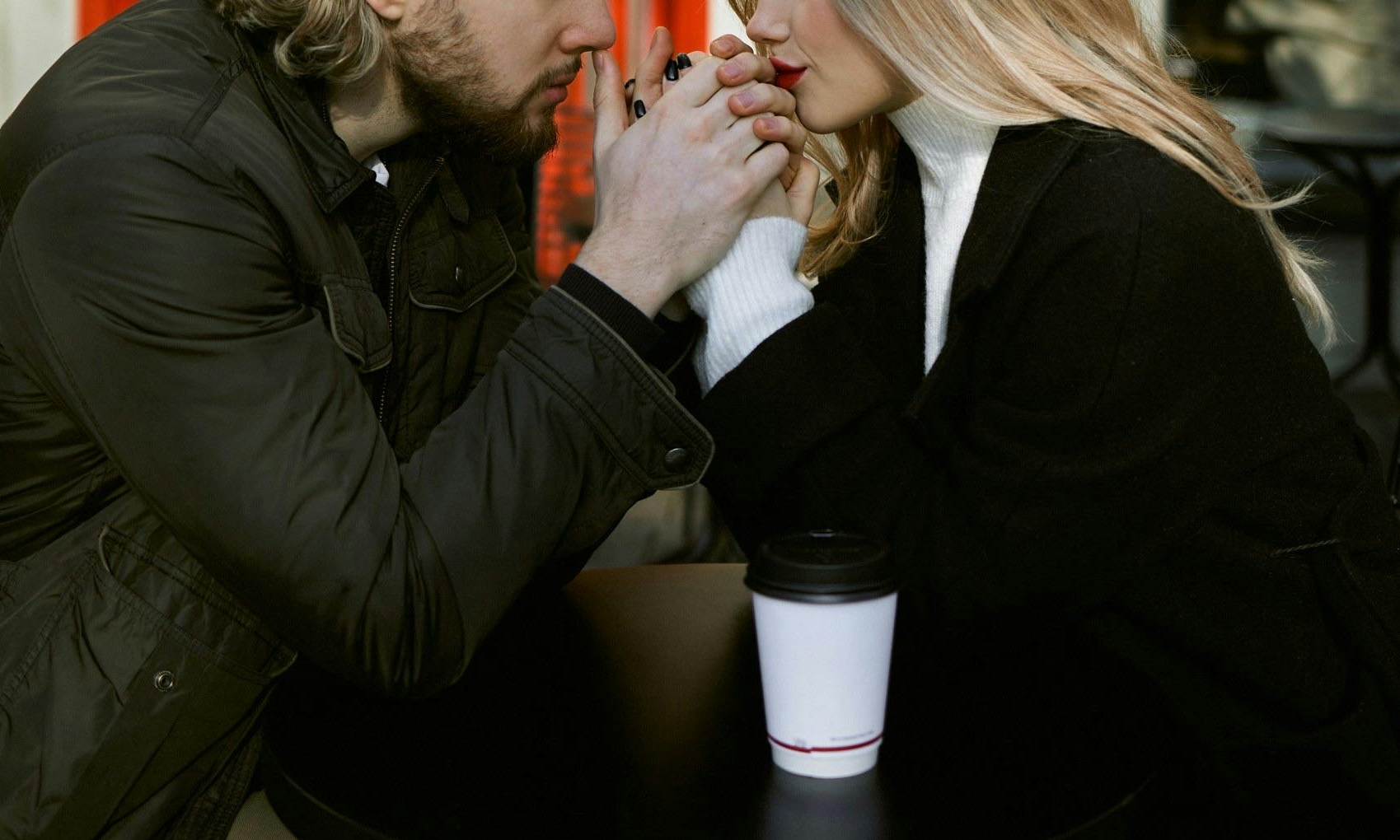Sophia and Jason talking intently at a cozy café | Source: Pexels