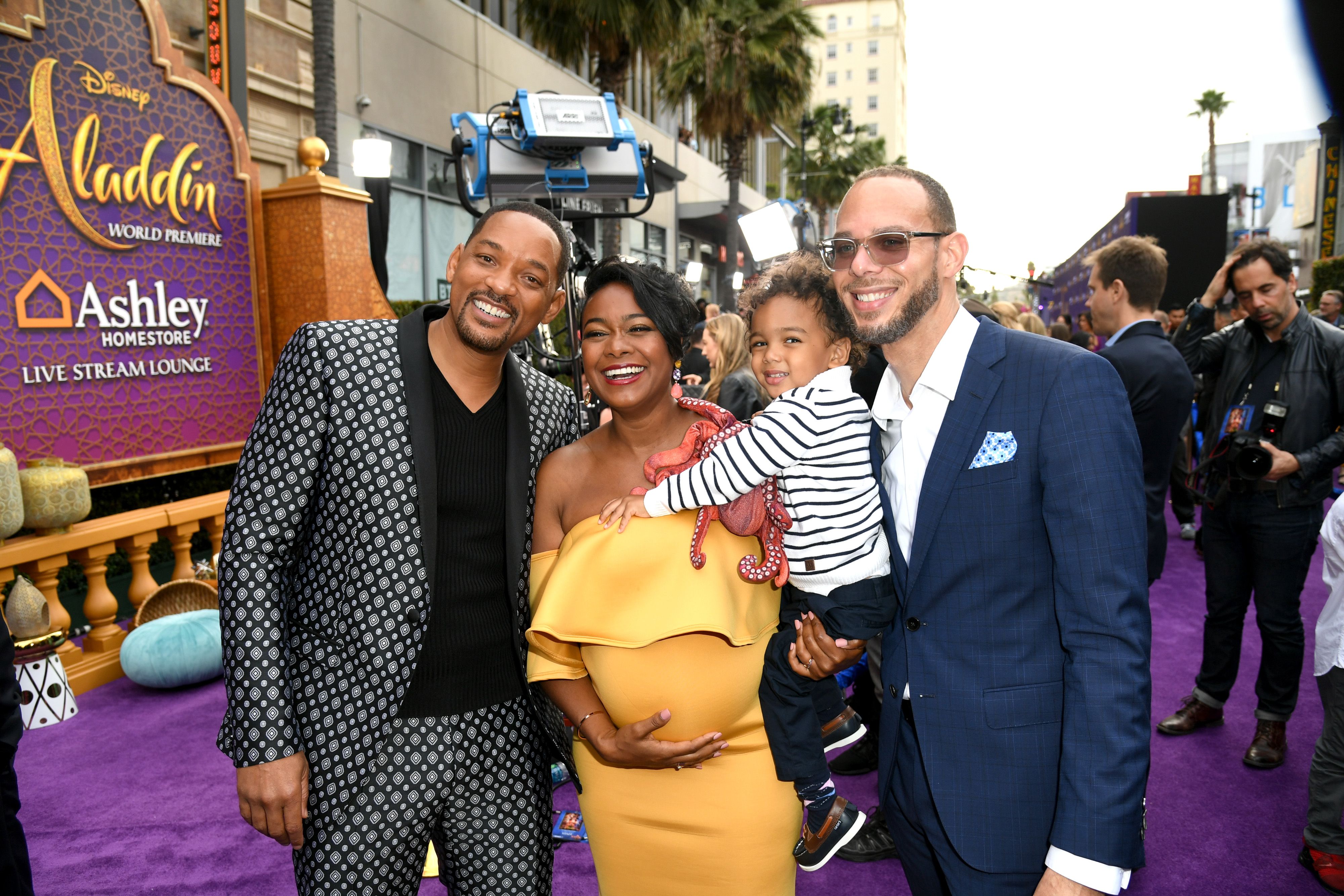 Will Smith, Tatyana Ali, Edward Aszard Rasberry, and Vaughn Rasberry at the premiere of Disney's "Aladdin" at El Capitan Theatre on May 21, 2019 | Photo: Getty Images