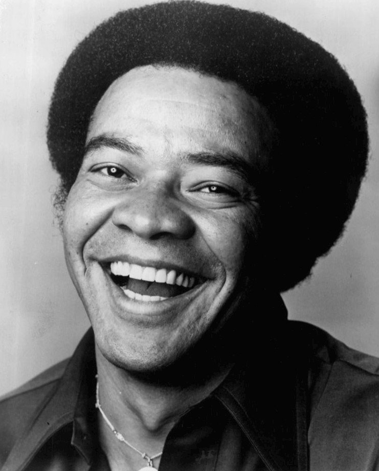 Portrait photo of Bill Withers taken in 1976. | Source: Wikimedia Commons.