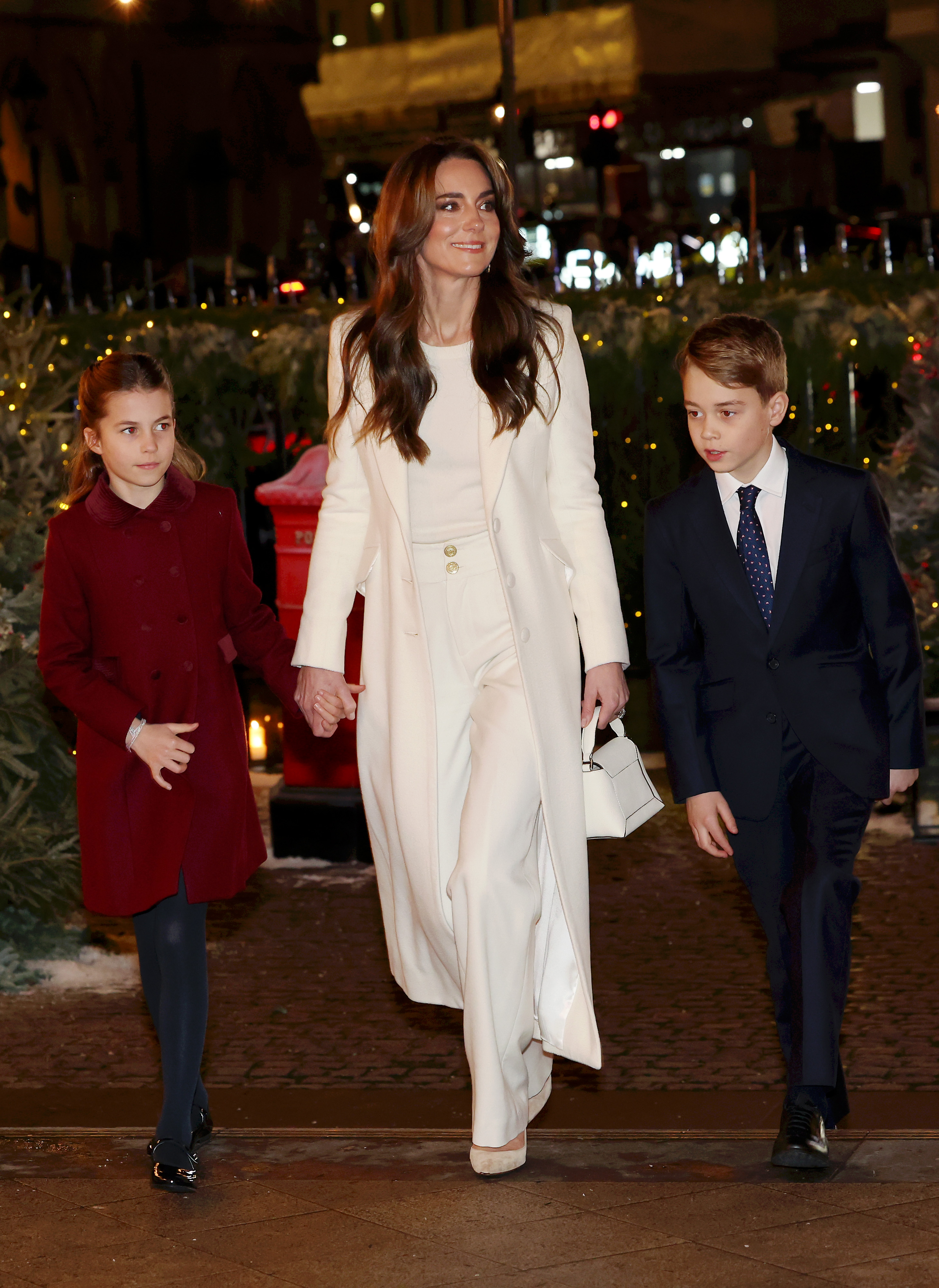 Princess Charlotte, Princess Catherine and Prince George at the  "Together At Christmas" Carol Service at Westminster Abbey in London, England on December 8, 2023 | Source: Getty Images