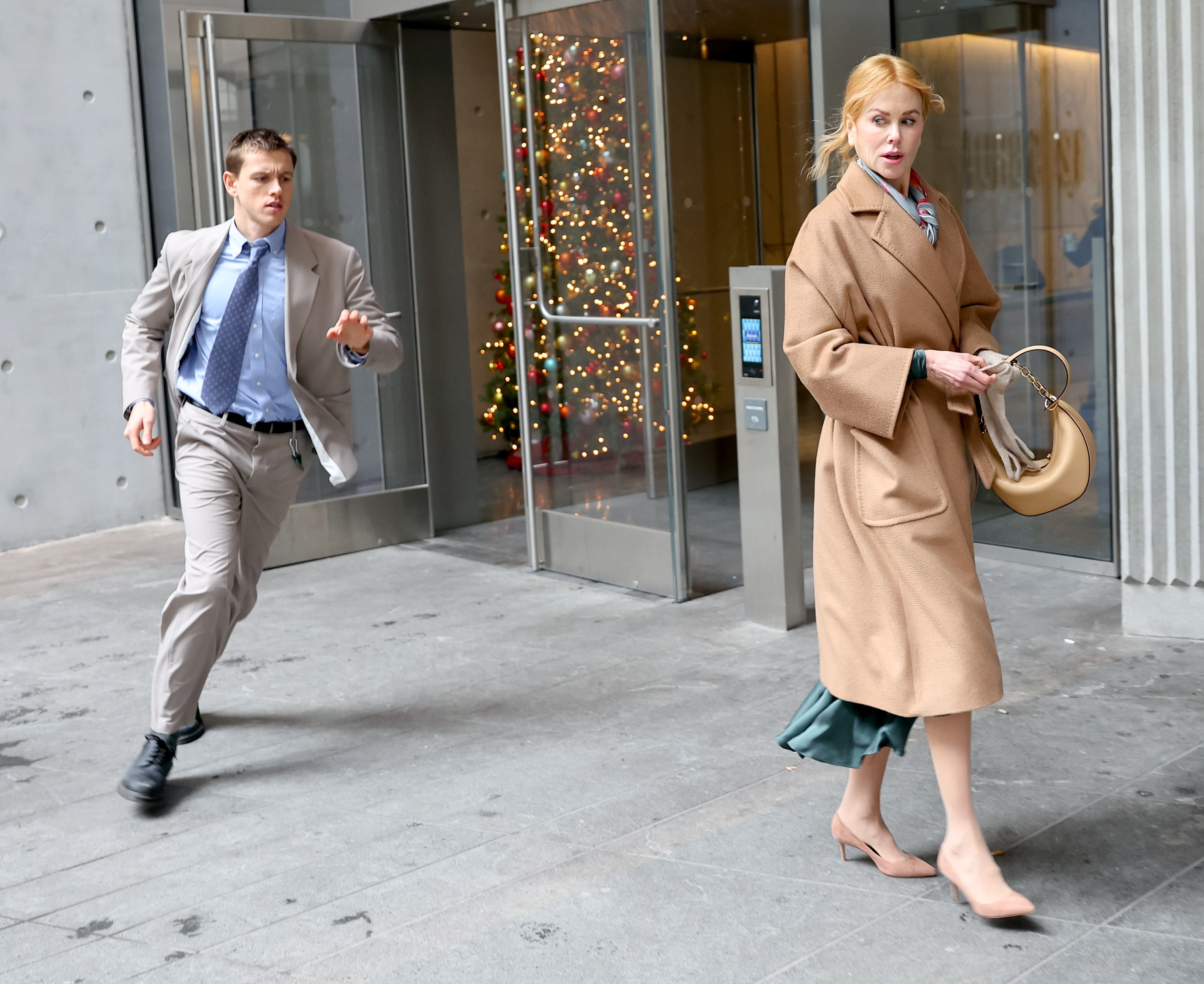 Nicole Kidman and Harris Dickinson are seen filming on the "Babygirl" movie set on December 11, 2023, in New York City. | Source: Getty Images