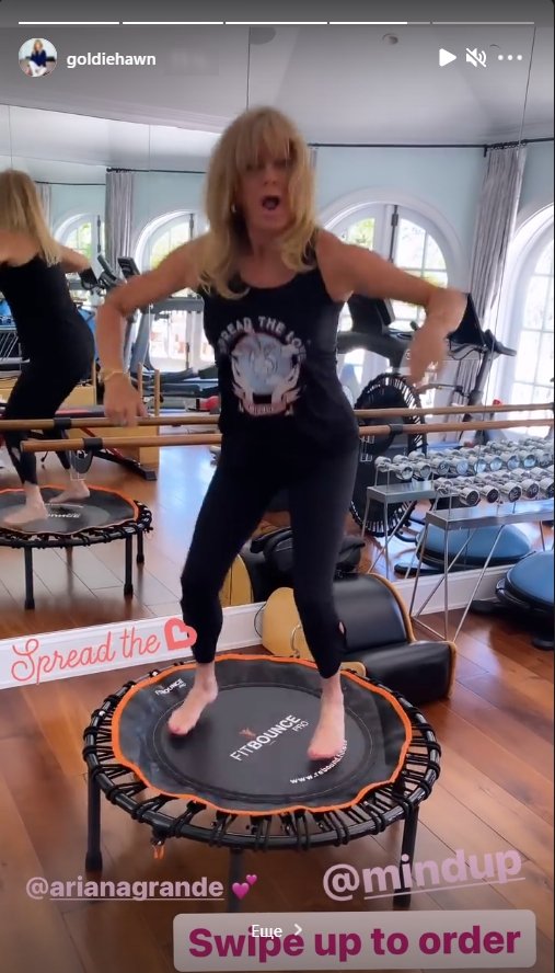 Goldie Hawn jumping up and down a mini trampoline for kids on her Instagram story | Photo: Instagram / goldiehawn