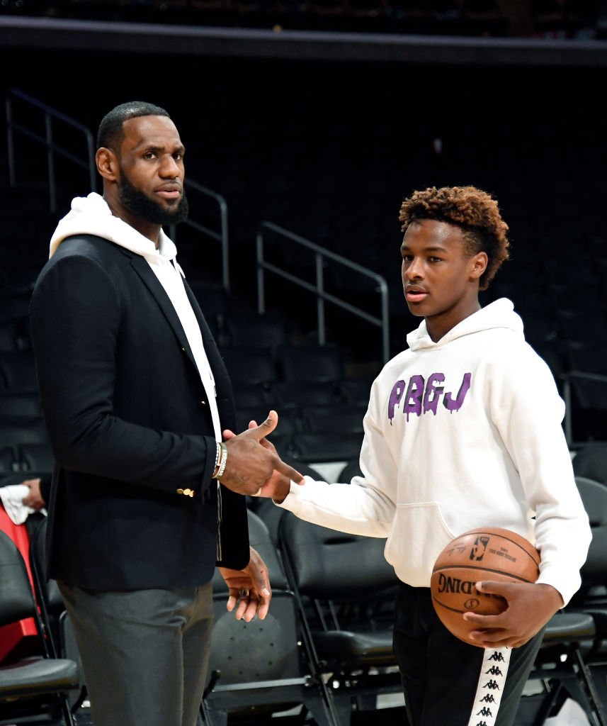  LeBron James #23 of the Los Angeles Lakers and his son LeBron James Jr., on the court after the Los Angeles Clippers and Los Angeles Lakers basketball game  | Getty Images