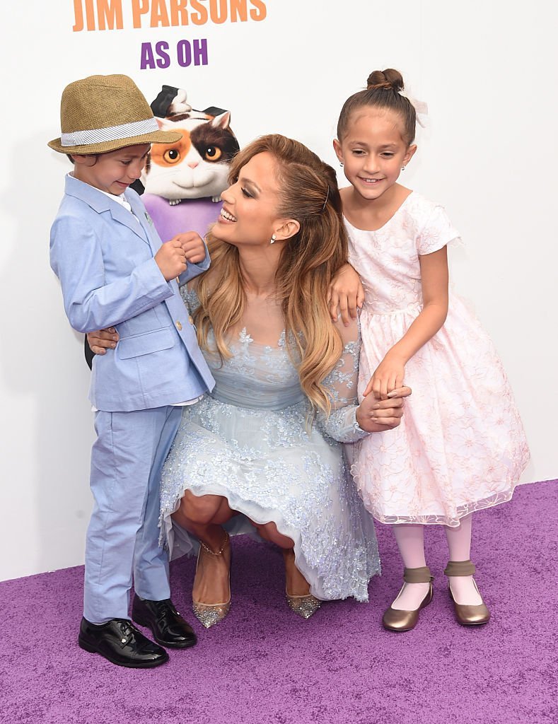 Jennifer Lopez (C) with daughter Emme (R) and son Max attend the premiere of Twentieth Century Fox And Dreamworks Animation's "HOME" at Regency Village Theatre on March 22, 2015, in Westwood, California. | Source: Getty Images.