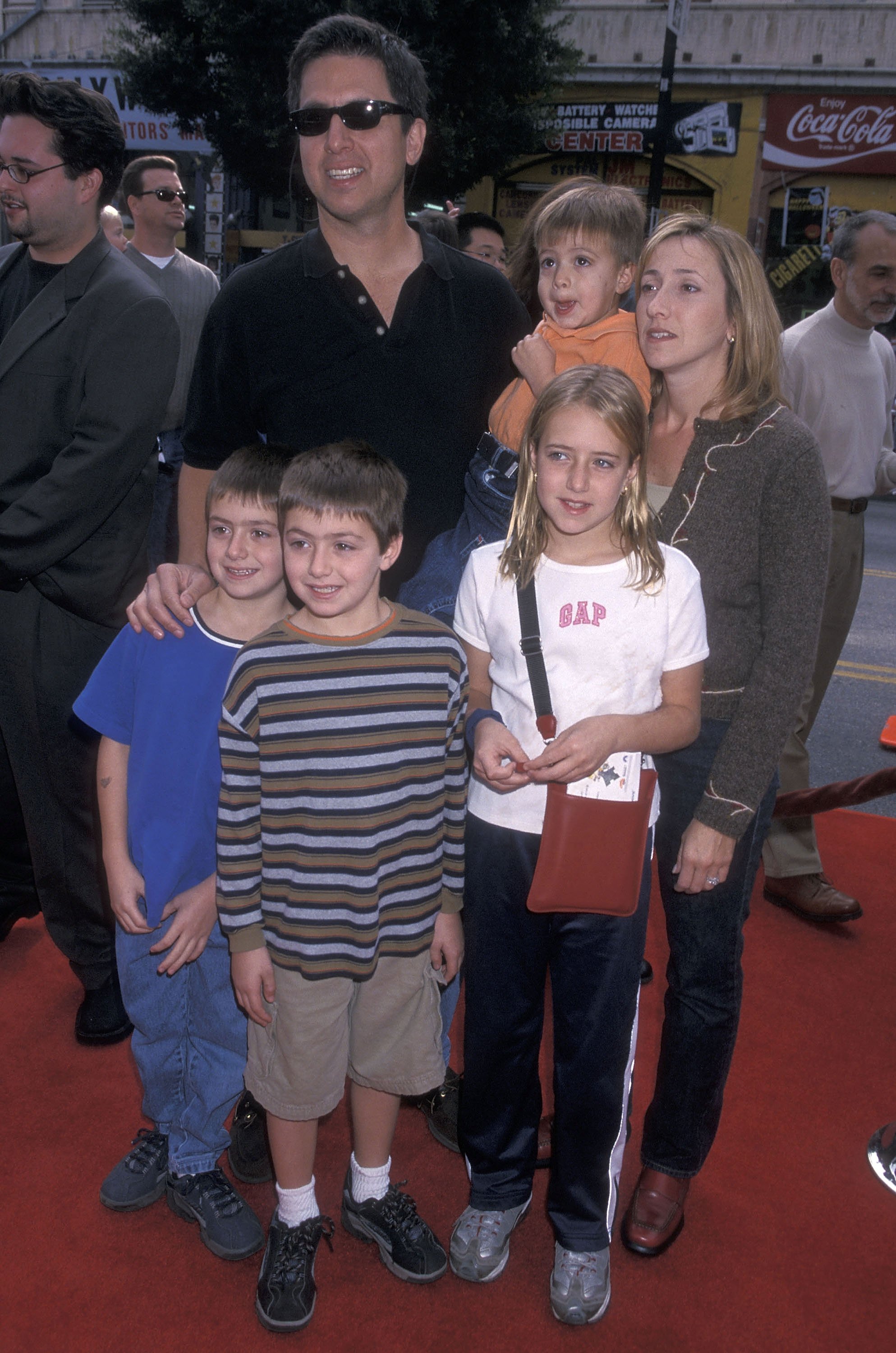 Actor Ray Romano, wife Anna Scarpulla, daughter Alexandra and sons, Matthew Gregory and Joseph attend "The Rugrats in Paris" Hollywood premiere on November 5, 2000 at the Mann's Chinese Theatre in Hollywood, California. | Source: Getty Images