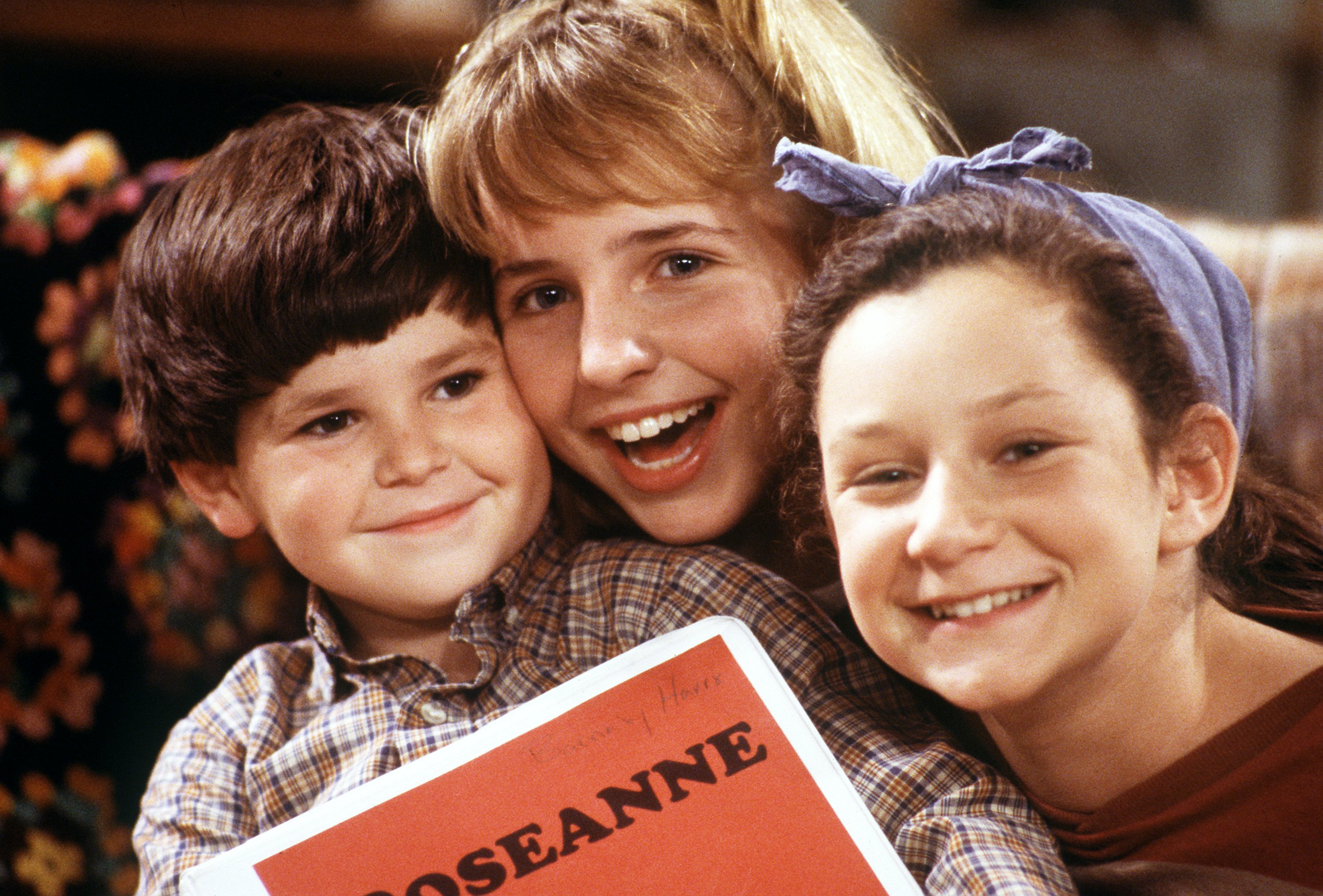 Picture of Michael Fishman, Lecy Goranson, Sara Gilbert in a scene of an episode of TV show, ROSEANNE which aired on November 29, 1988 | Source: Getty Images