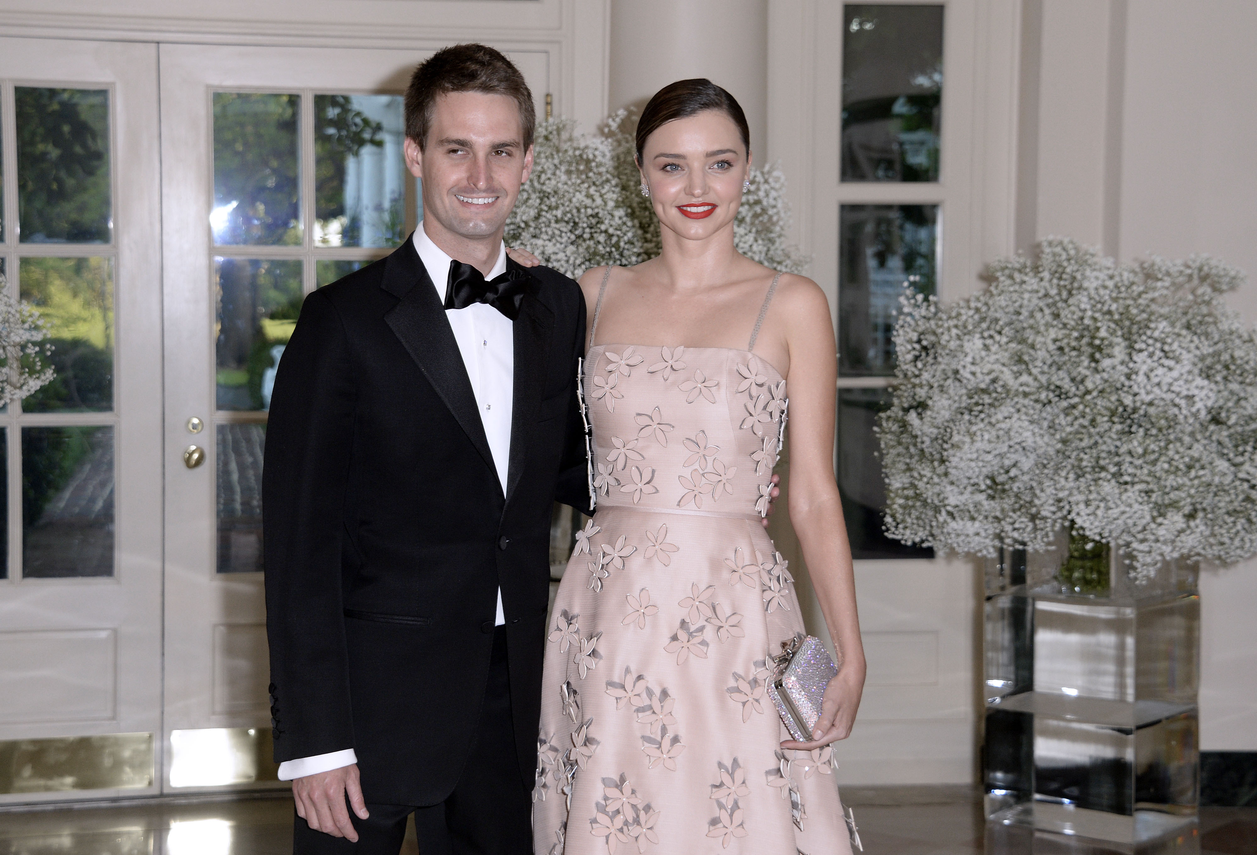 Miranda Kerr and Evan Spiegel attend a state dinner on May 13, 2016 in Washington, DC | Source: Getty Images