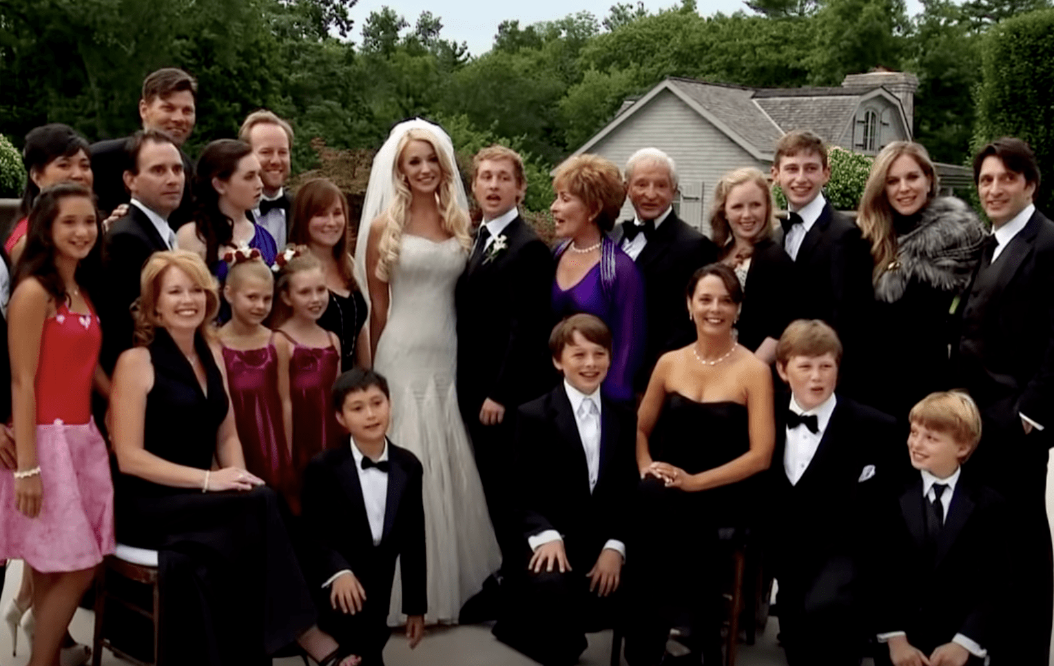 Judy and Jerry Sheindlin, Casey Barber and his bride, and other family members at Casey's wedding on September 11, 2013 | Source: YouTube/Entertainment Tonight