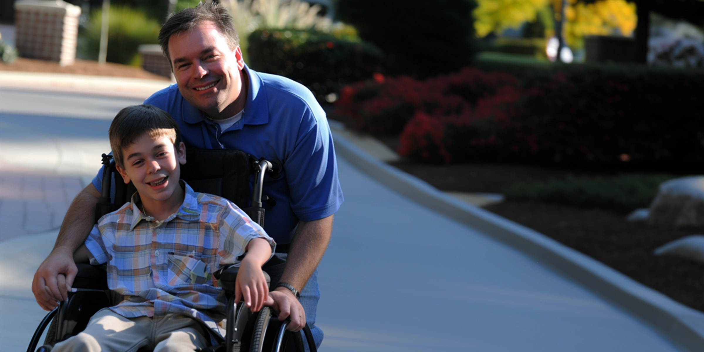 A man accompanying a boy in a wheelchair | Source: Amomama