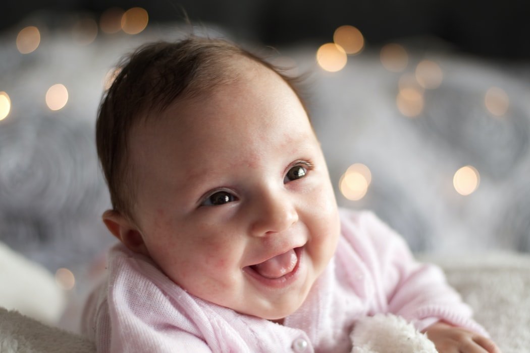 Sweet smiling baby | Source: Unsplash