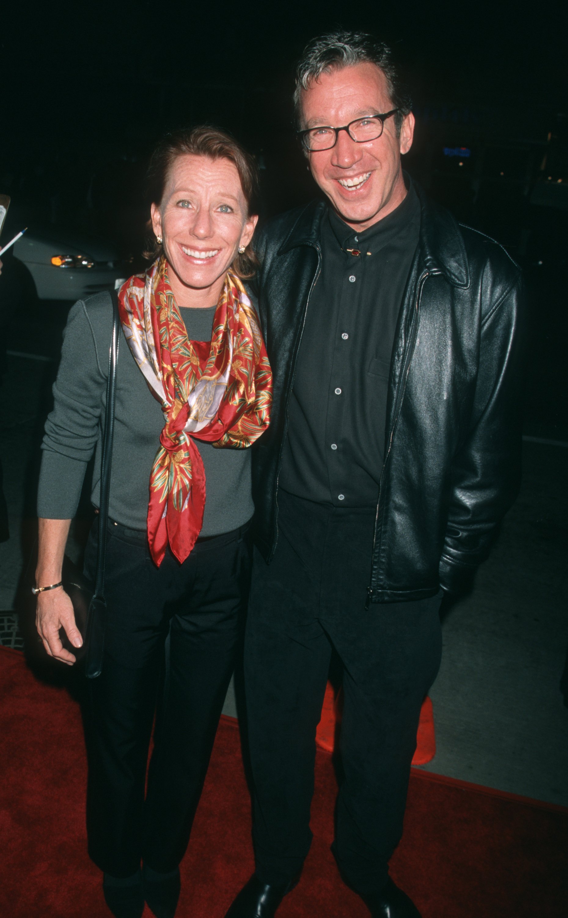 Laura Diebel and Tim Allen pose during the Westwood Premiere of "Beloved" at Mann Bruin Theatre on an unspecified date, in Westwood, California | Source: Getty Images