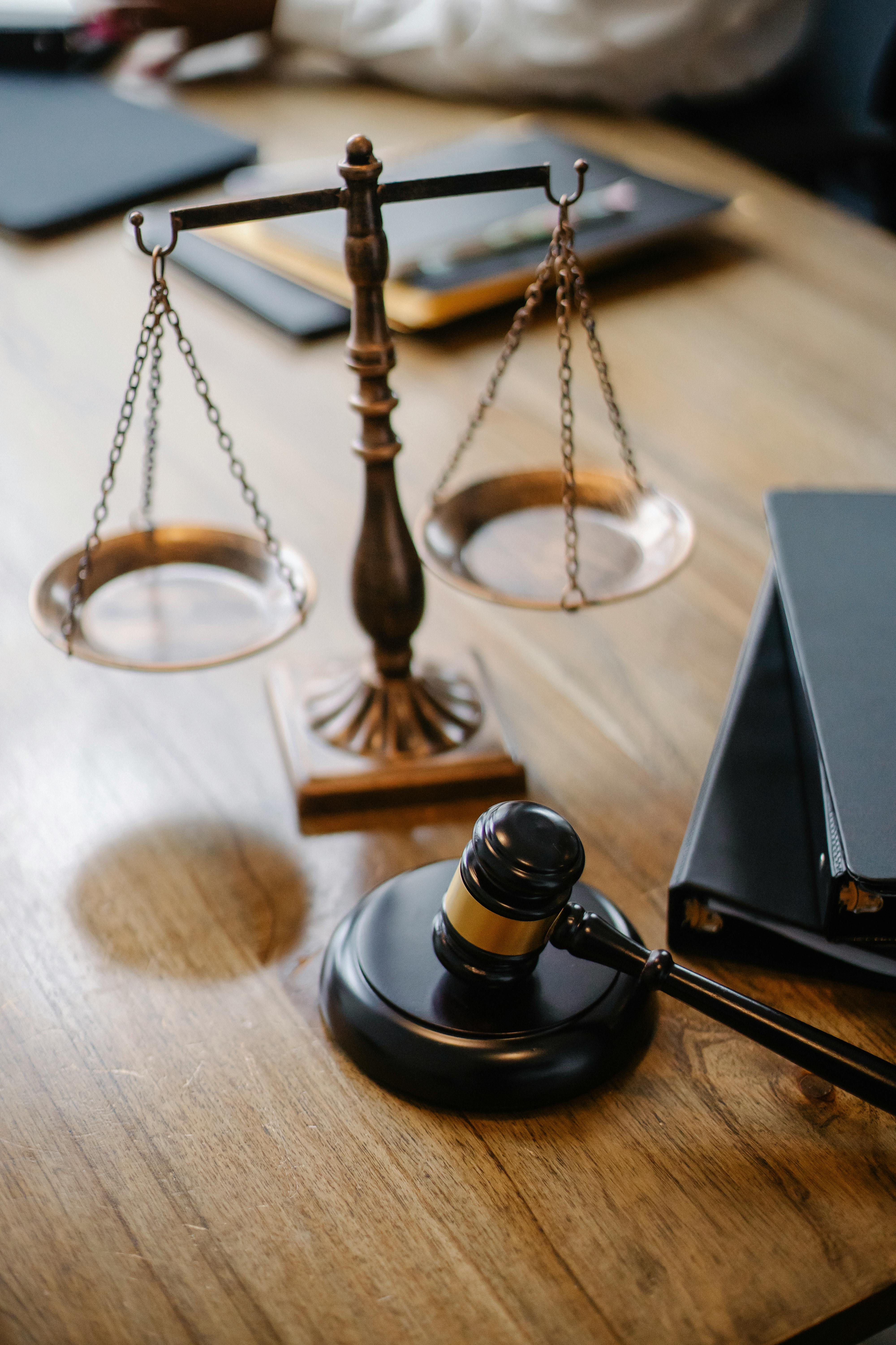 A justice scale and judge's hammer | Source: Pexels