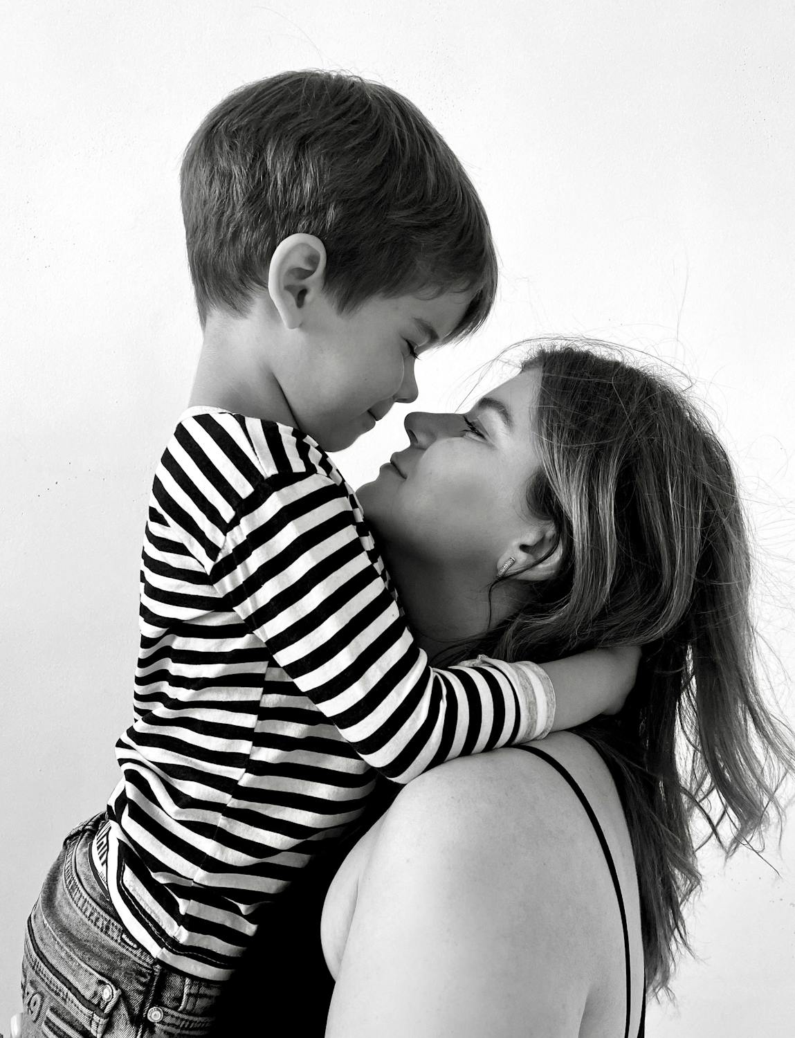 A woman holding her son | Source: Pexels