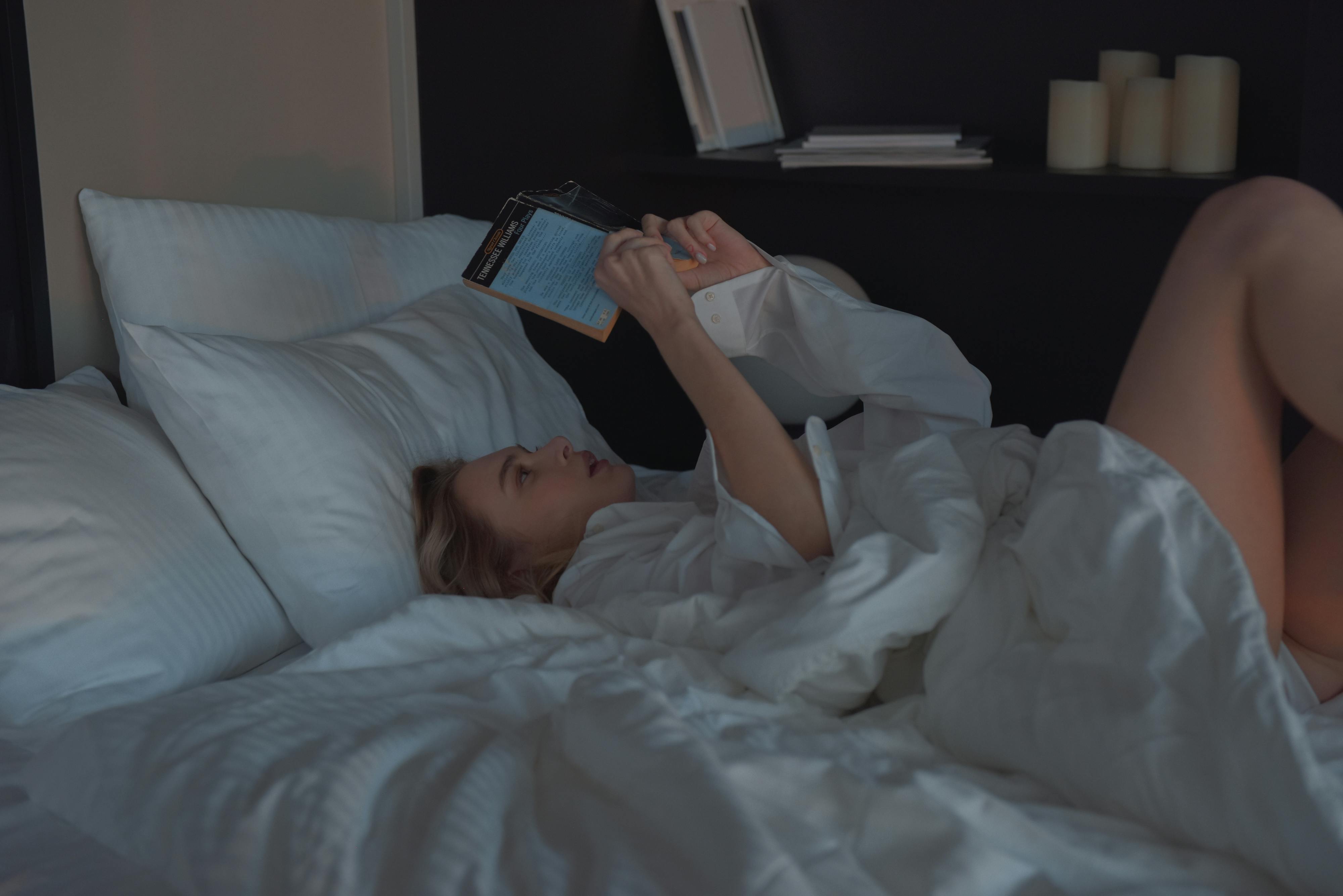 Reading before bed may help some people unwind naturally. | Source: Pexels