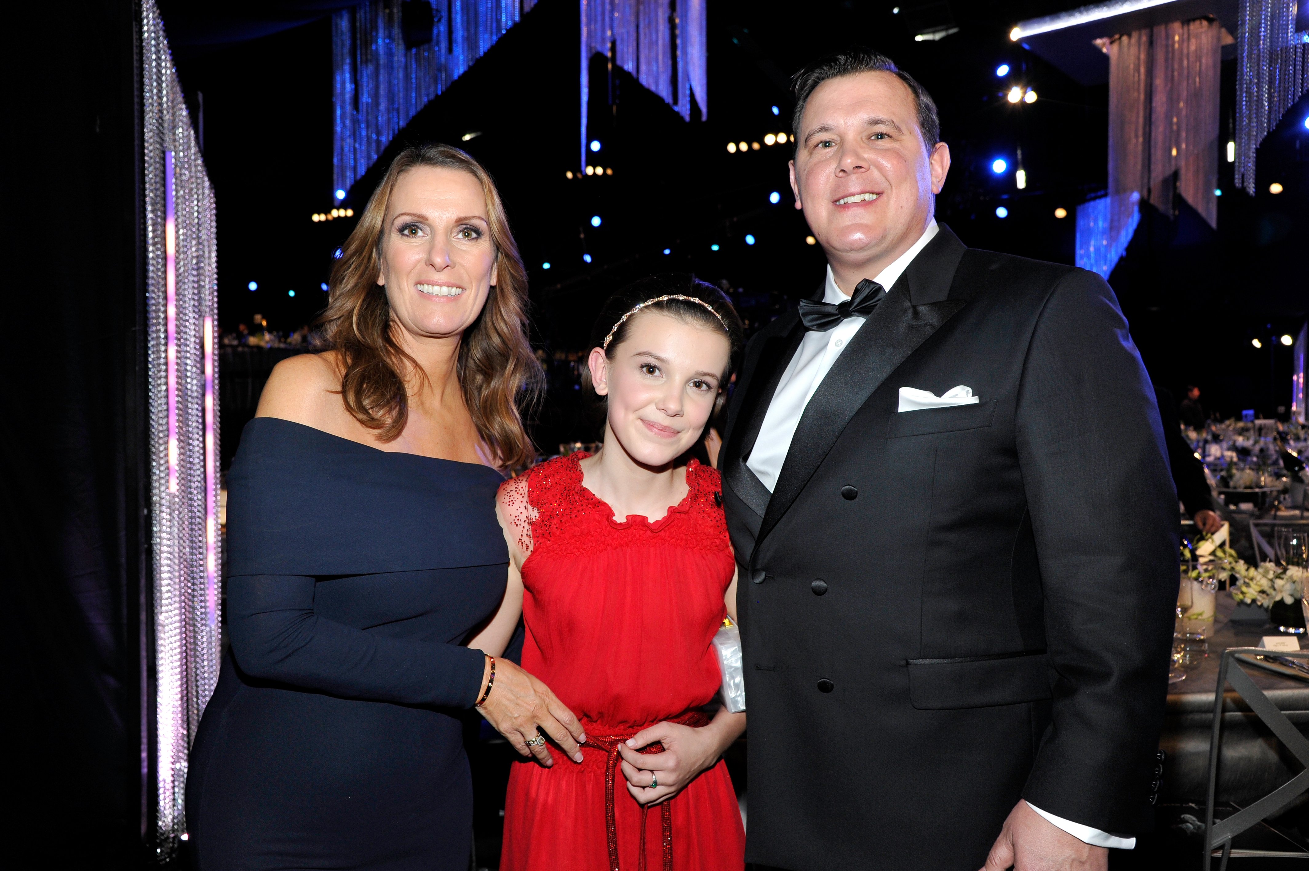 Actress Millie Bobby Brown (center) and her parents attend The 23rd Annual Screen Actors Guild Awards Cocktail Reception at The Shrine Auditorium, on January 29, 2017, in Los Angeles, California. | Source: Getty Images
