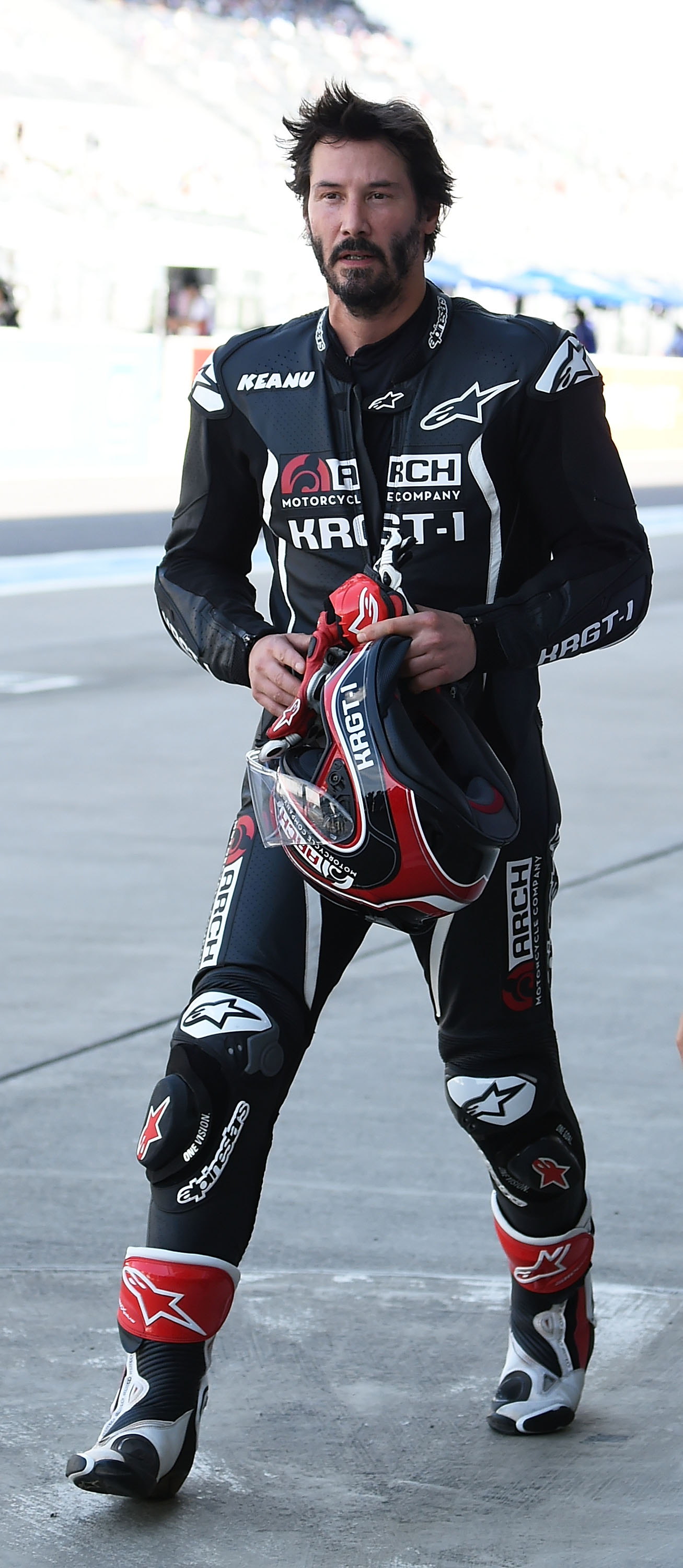 Keanu Reeves test-rides his Arch Motorcycle during the Suzuka 8 Hours at the Suzuka Circuit Japan, on July 25, 2015 | Source: Getty Images