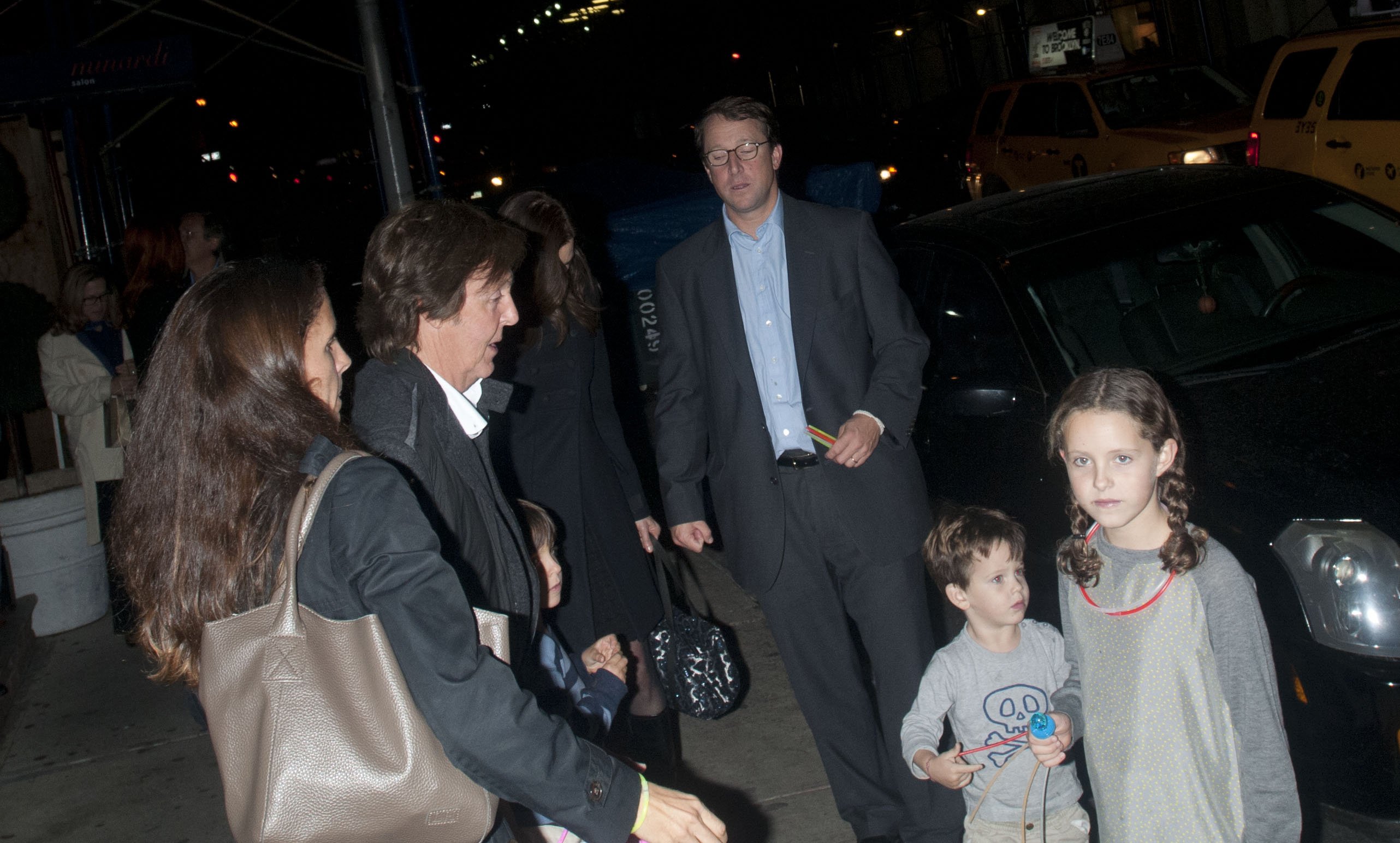 Paul McCartney, Nancy Shevell, and Beatrice McCartney leaving a party on October 24, 2012, in New York | Source: Getty Images