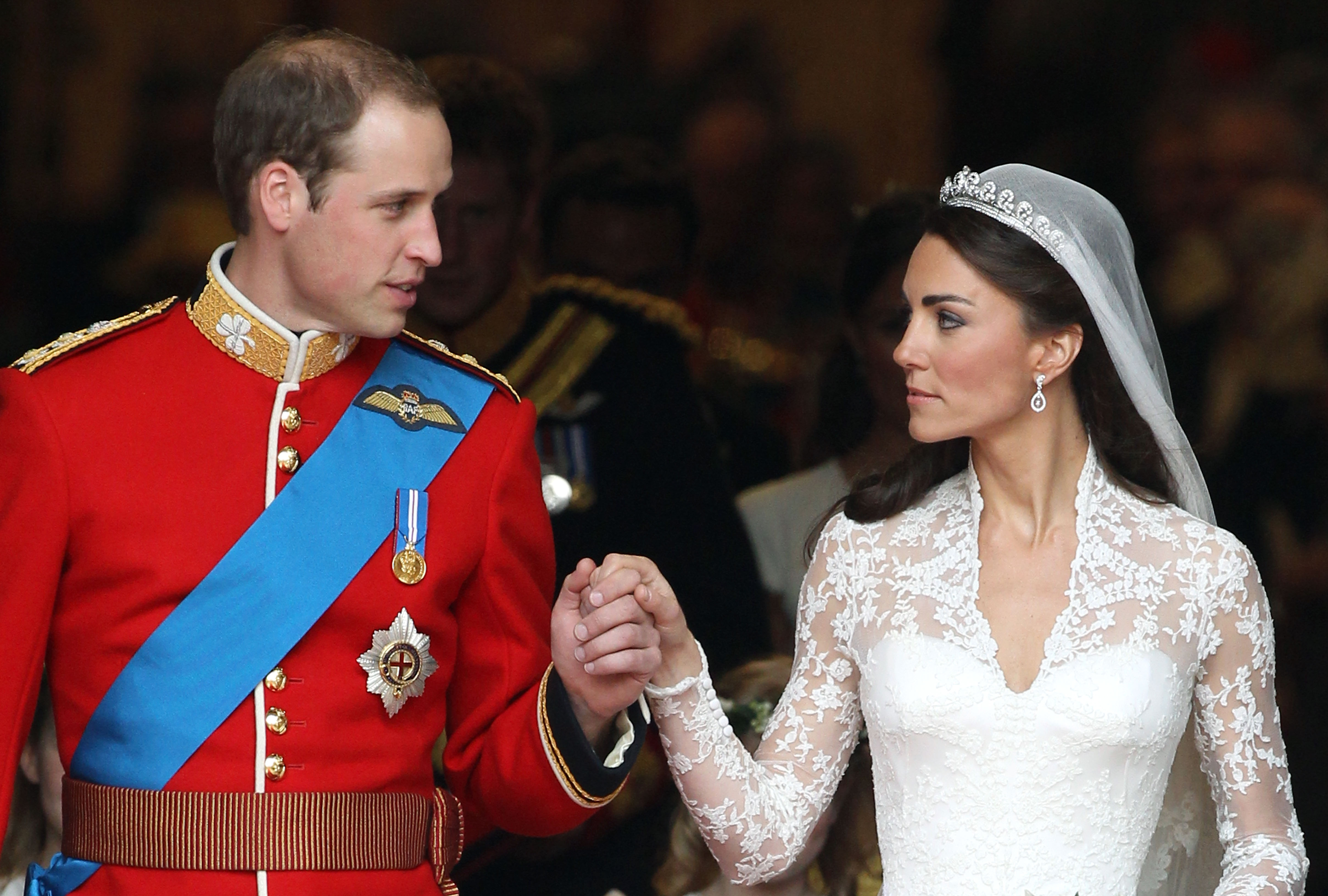 Catherine, Duchess of Cambridge, and Prince William smile following their marriage at Westminster Abbey in London, England, on April 29, 2011 | Source: Getty Images