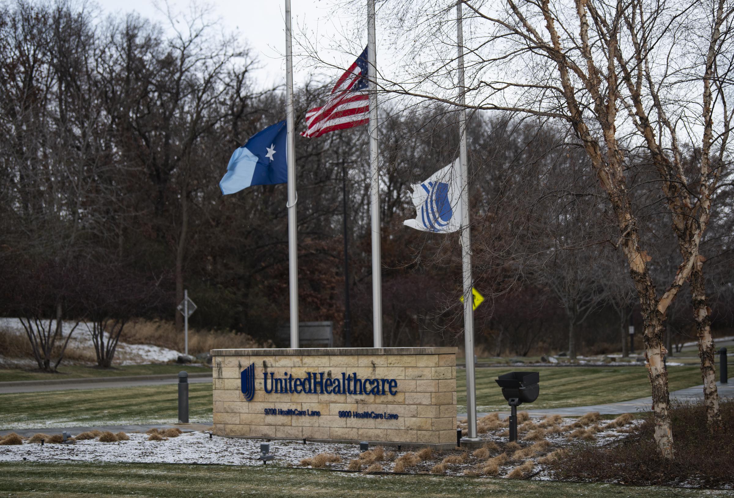 Flags fly at half-mast outside UnitedHealthcare's headquarters in Minnetonka, Minnesota, after CEO Brian Thompson's death on December 4, 2024 | Source: Getty Images