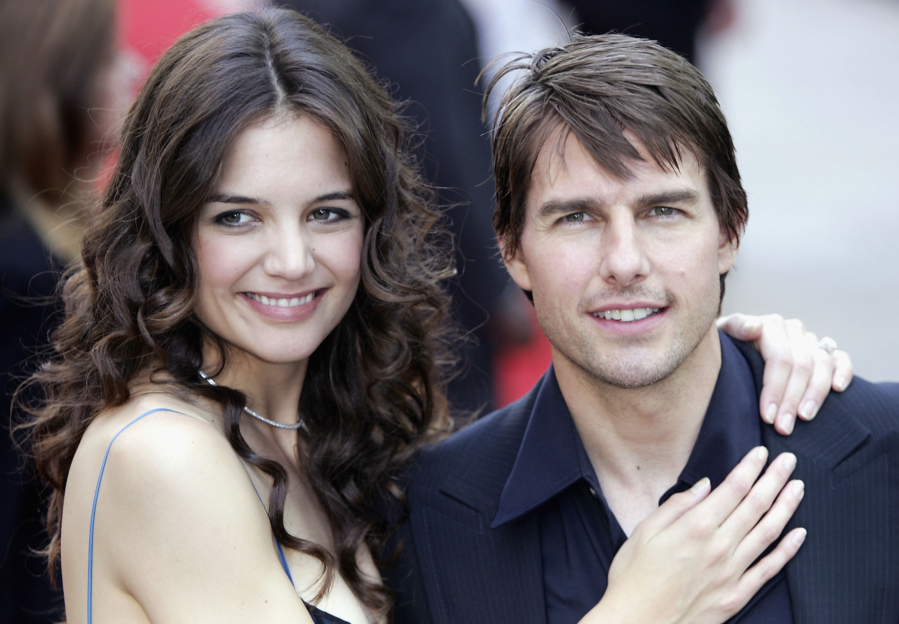 Tom Cruise and his fiancée Katie Holmes at the UK premiere of "War Of The Worlds" on June 19, 2005, in London, England | Source: Getty Images
