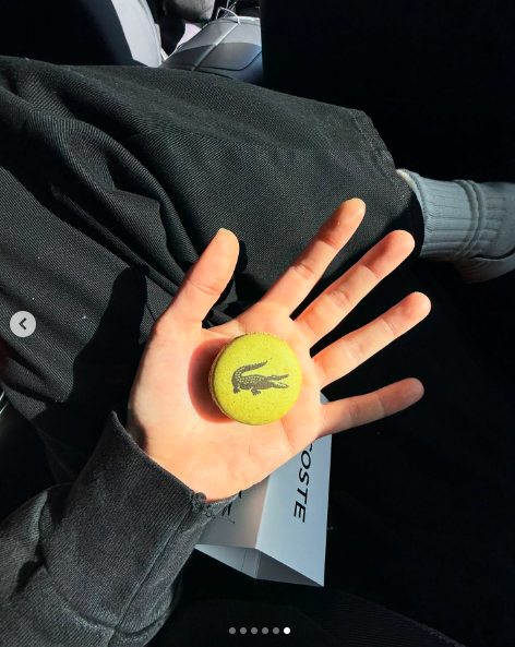 Ella Emhoff holding a Lacoste-branded object in her hand. | Source: Instagram/ellaemhoff