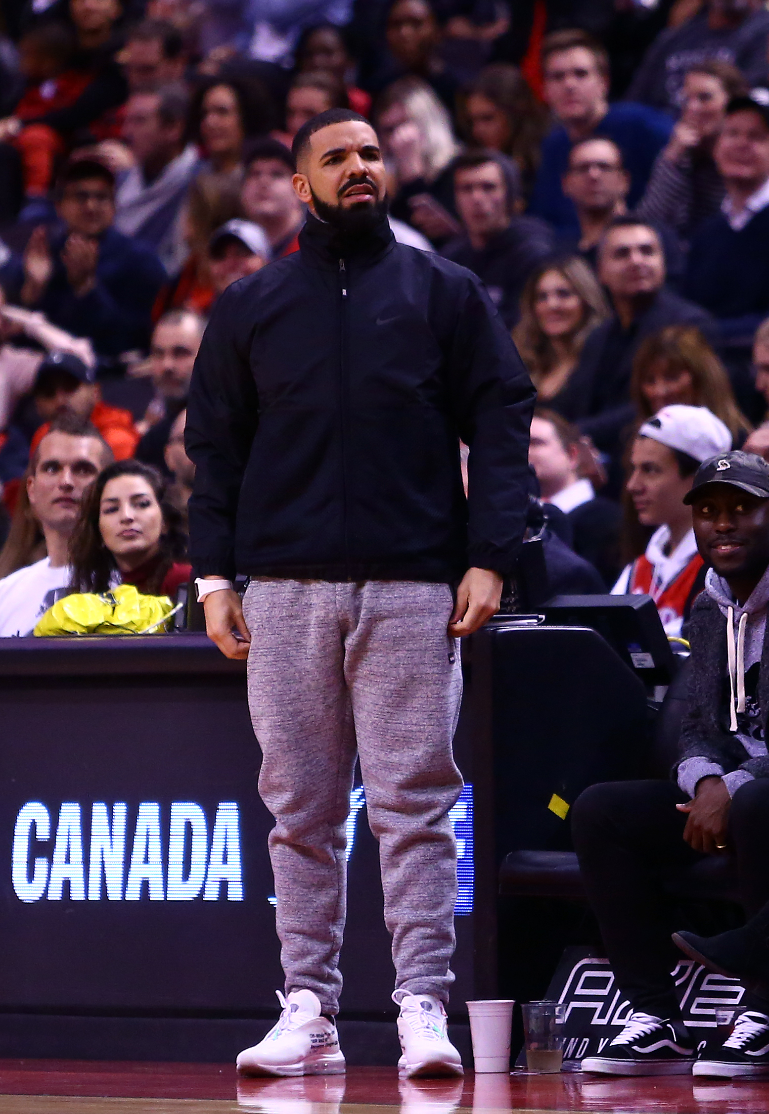 Drake reacts to a call by an official during the first half of an NBA game between the Indiana Pacers and the Toronto Raptors at Air Canada Centre in Toronto, Canada, on December 1, 2017 | Source: Getty Images