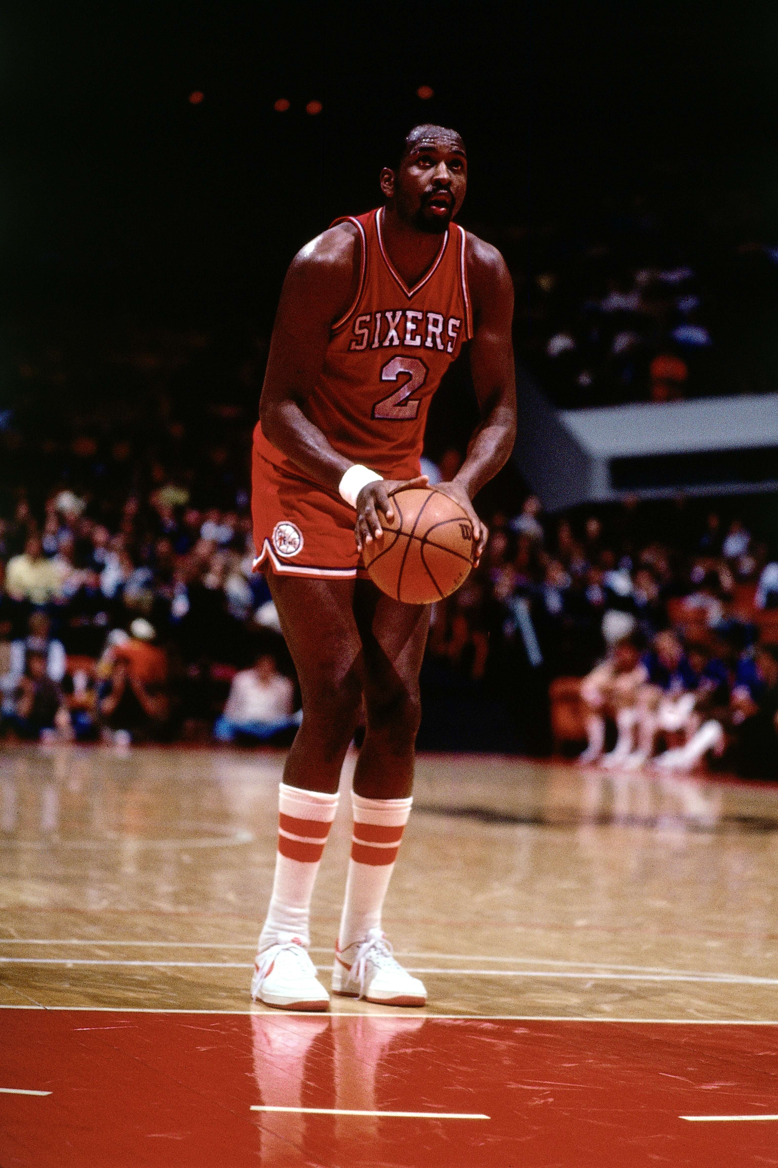 Moses Malone shoots a free throw against the Atlanta Hawks at The Omni during the 1983 NBA season | Photo: Getty Images