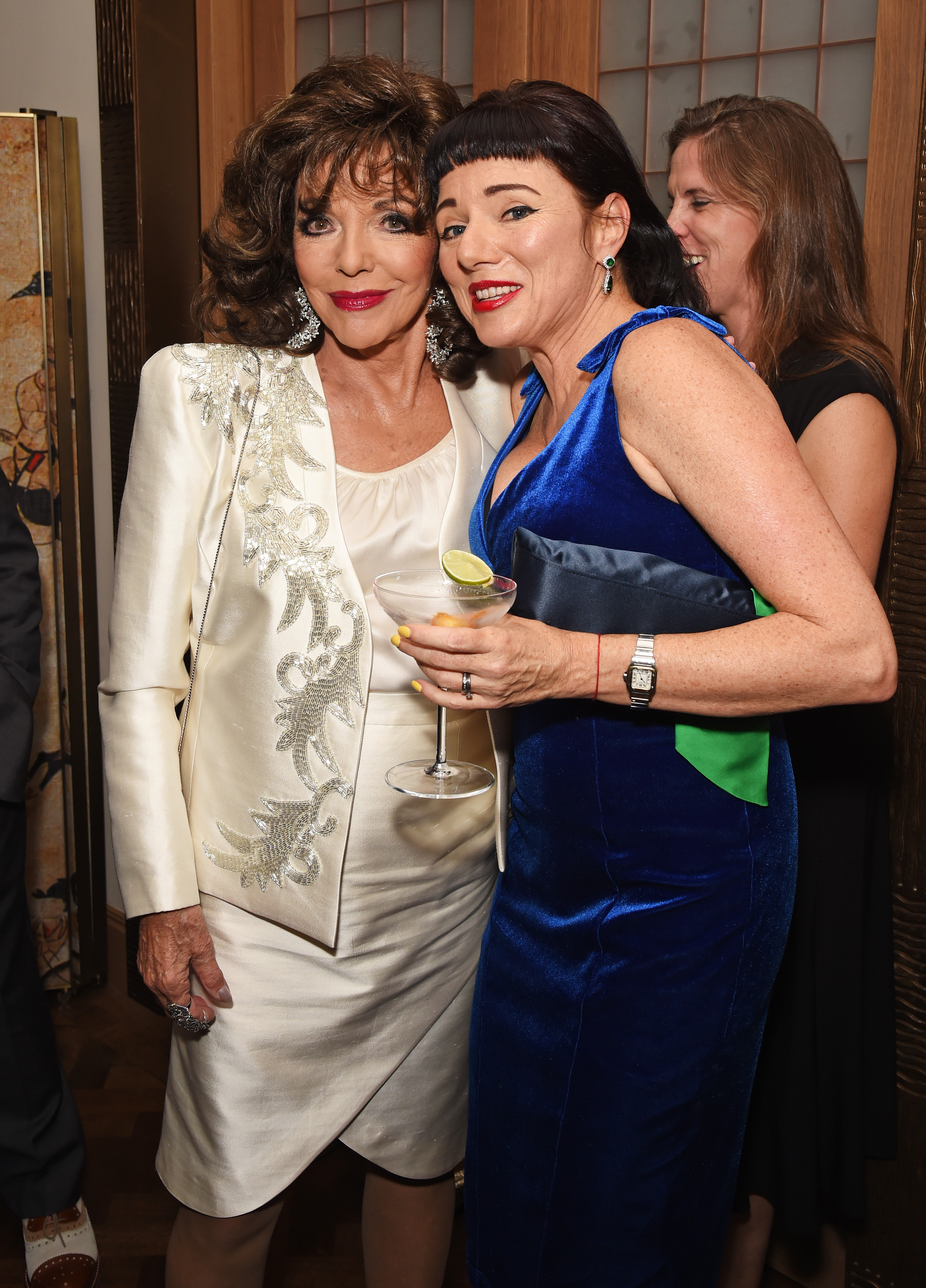 Joan Collins and daughter Tara Newley attend an after party following at the Cafe Royal in London, England on September 30, 2016 | Source: Getty Images