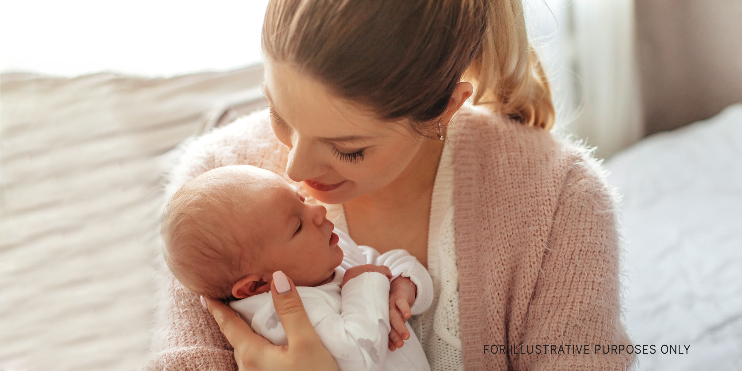 A woman and baby | Source: Shutterstock