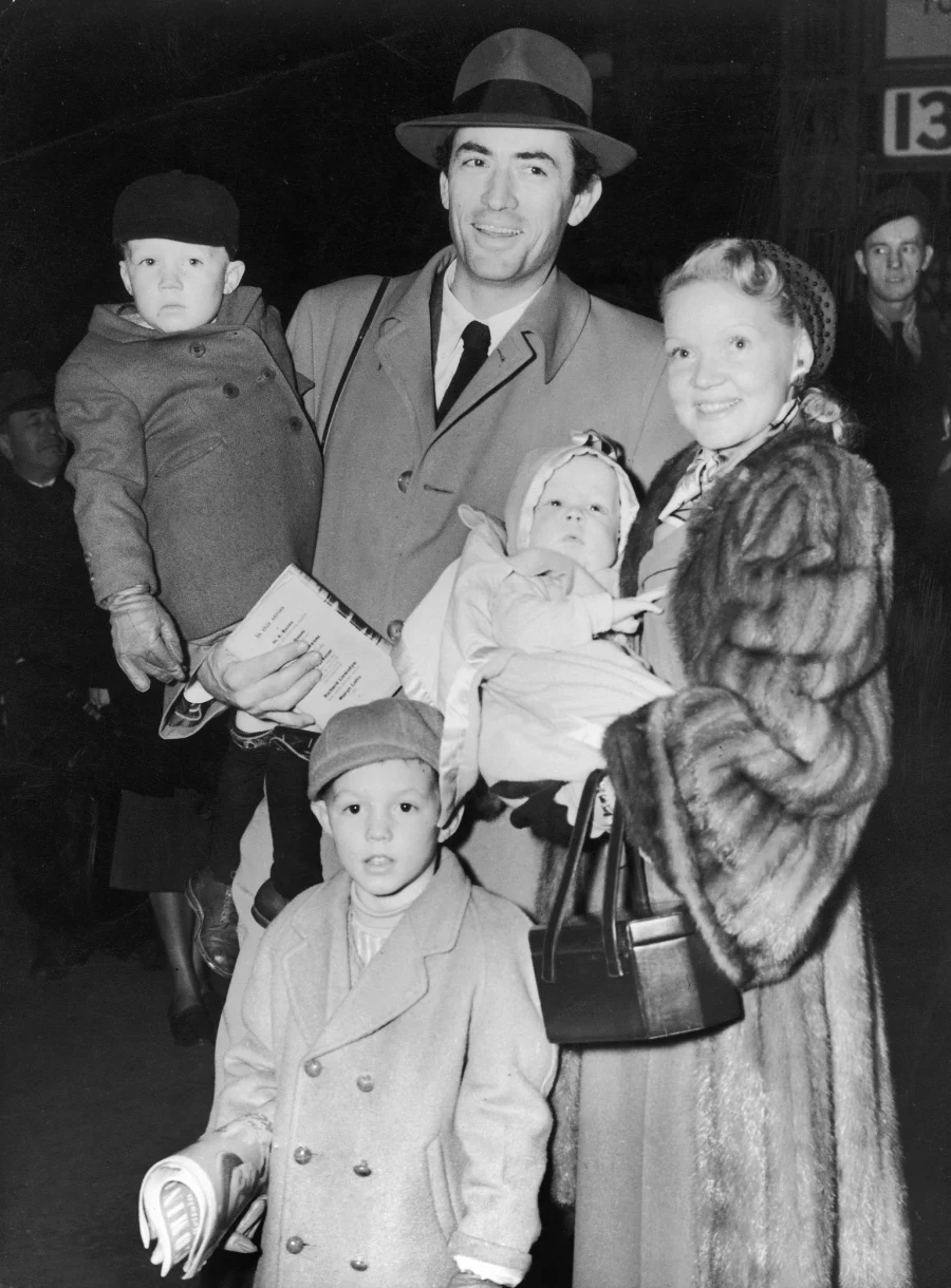 Gregory Peck with his first wife Greta Kukkonen and their three sons. Gregory holds Stephen, Greta holds Carey, and Jonathan is at bottom. | Source: Getty Images