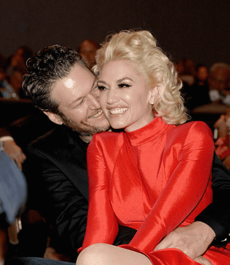 Blake Shelton and Gwen Stefani enjoy valentines day at the 2016 Pre-GRAMMY Gala, at the Beverly Hilton Hotel, on February 14, 2016, in Beverly Hills, California | Source: Getty Images (Photo by Kevin Mazur/WireImage)