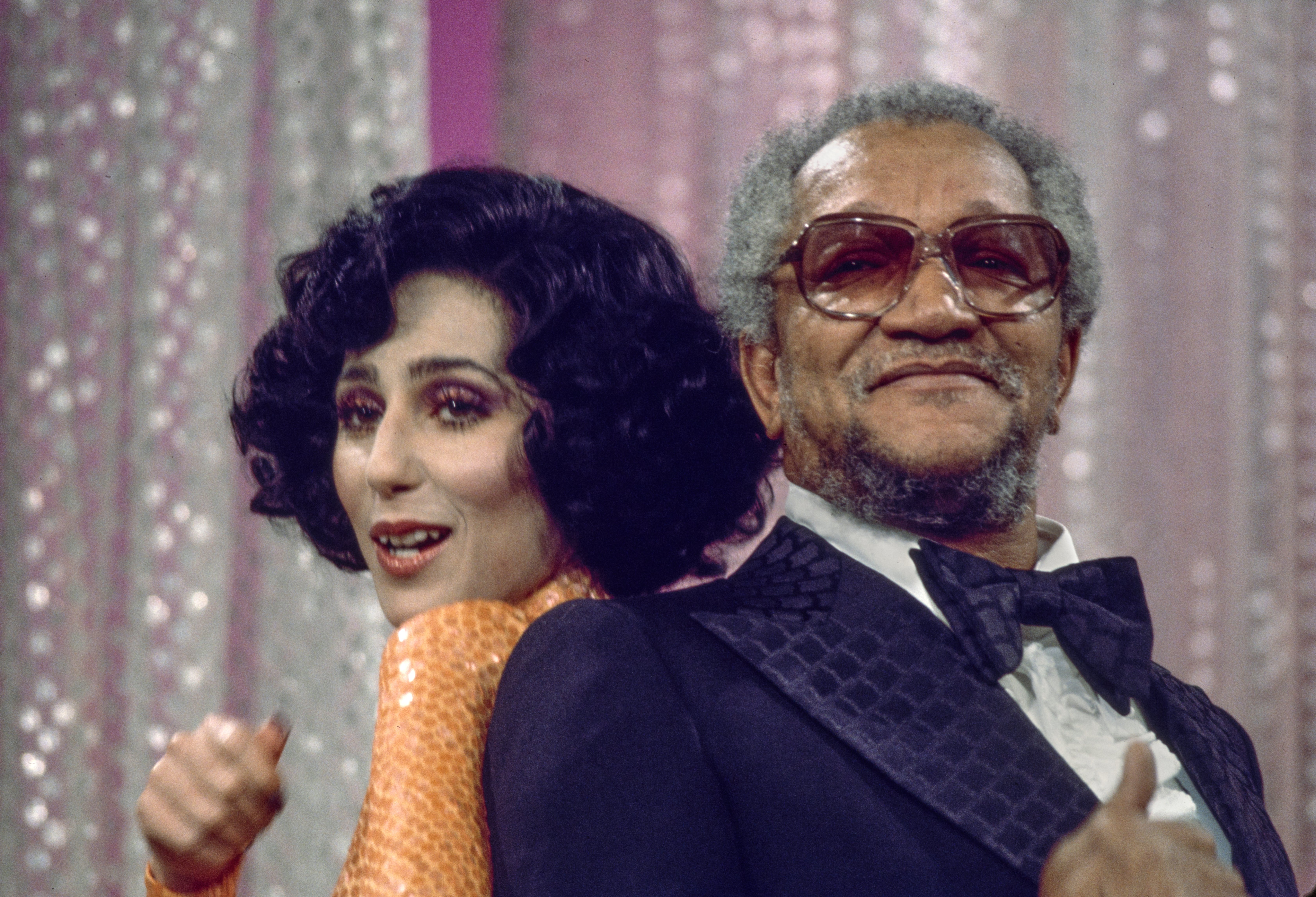 Cher and Redd Foxx photographed together on Cher's solo music and variety show. | Source: Getty Images