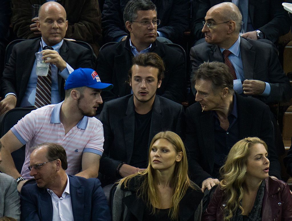 Liam Neeson and his sons Daniel Neeson, and Micheál Richardson at a game at Madison Square Garden on March 23, 2016, in New York City | Photo: TM/NHL/GC Images/Getty Images