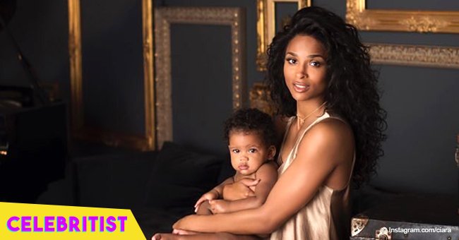 Ciara & 1-year-old daughter Sienna pose in matching white swimsuits in latest photoshoot