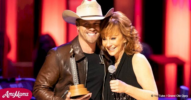 Amazing moment Dustin Lynch was inducted into the Grand Ole Opry by Reba McEntire (video)