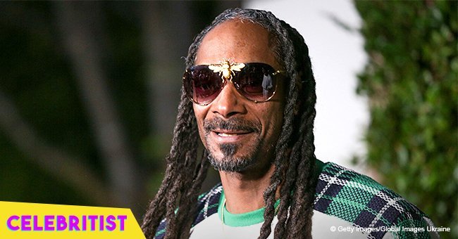 Snoop Dogg's teen daughter glows with happiness in her boyfriend's embrace in new photo