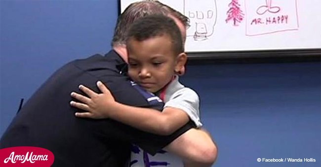 5-year-old surprises entire police station after he walks in with inspiring sign around his neck