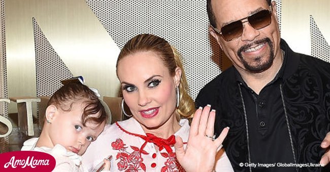 Ice-T's wife Coco dazzles in red and white as she poses with her husband and baby