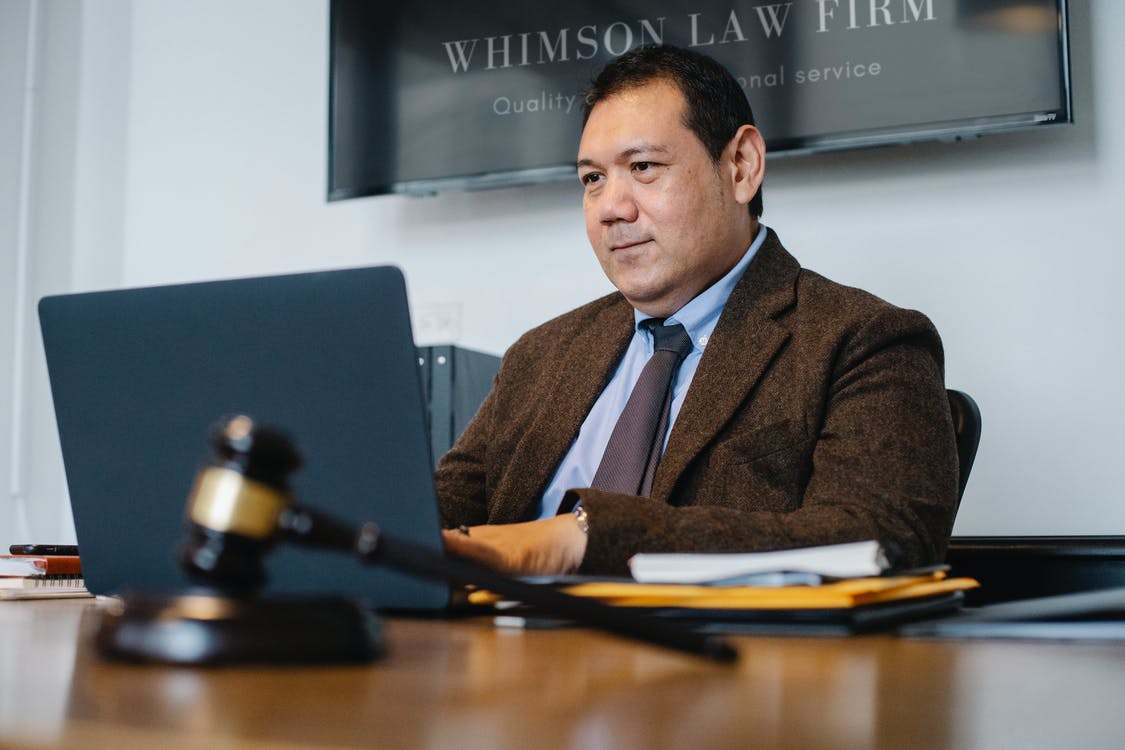 A photo of a lawyer at his office. | Photo: Pexels