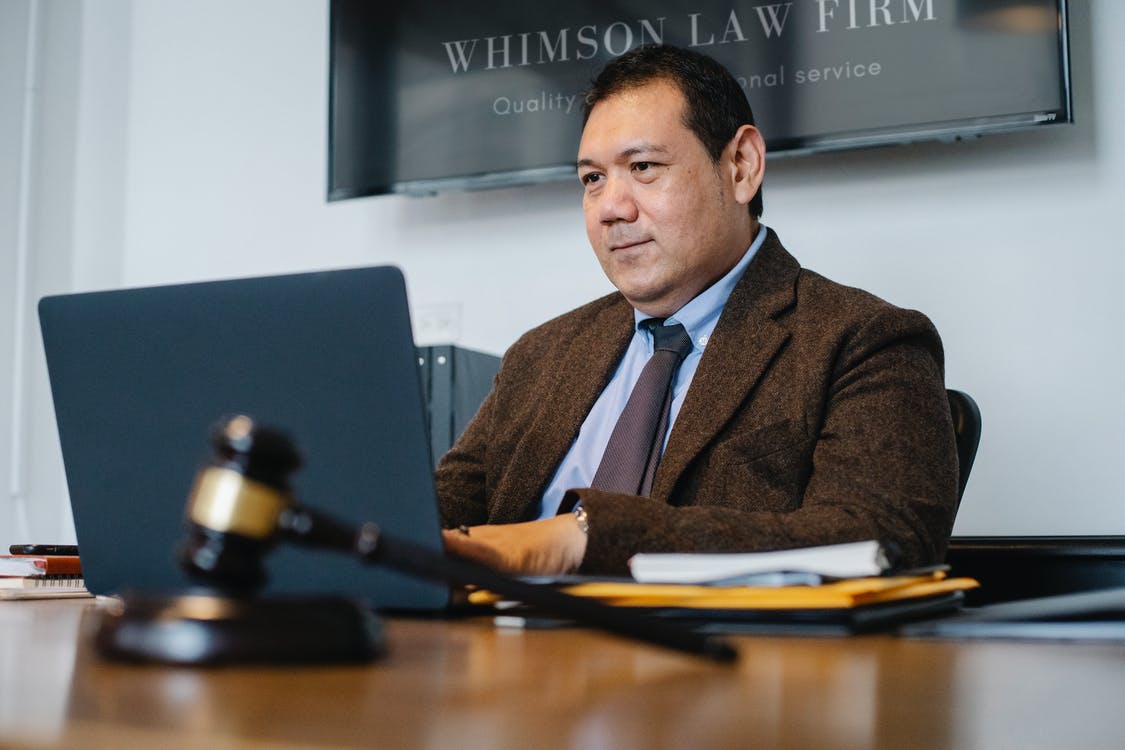 A photo of a man in his office. | Photo: Pexels