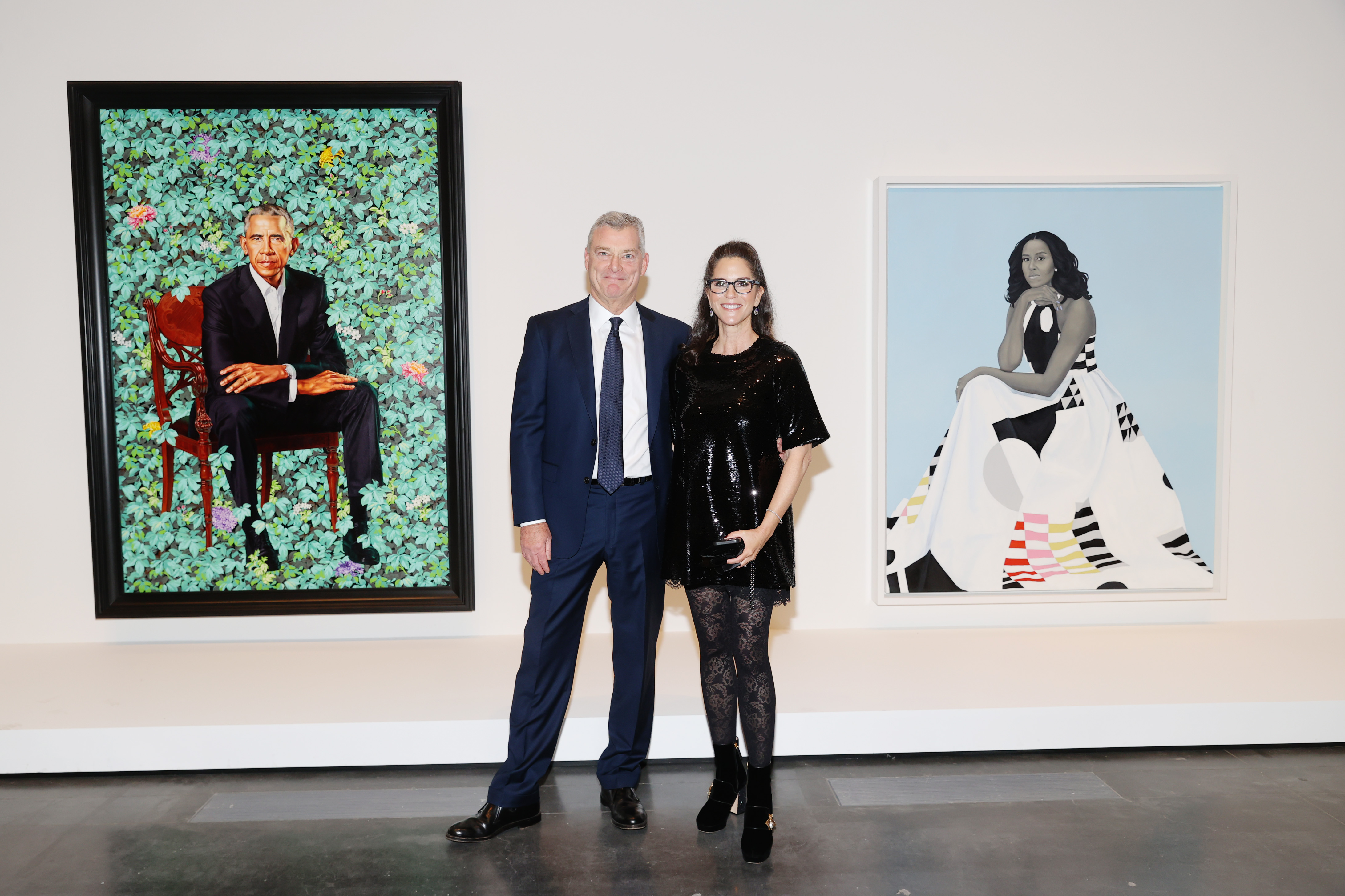 Standing between striking portraits of Barack and Michelle Obama, Jami Gertz shone in a sequined black dress alongside Tony Ressler at LACMA’s Art+Film Gala.