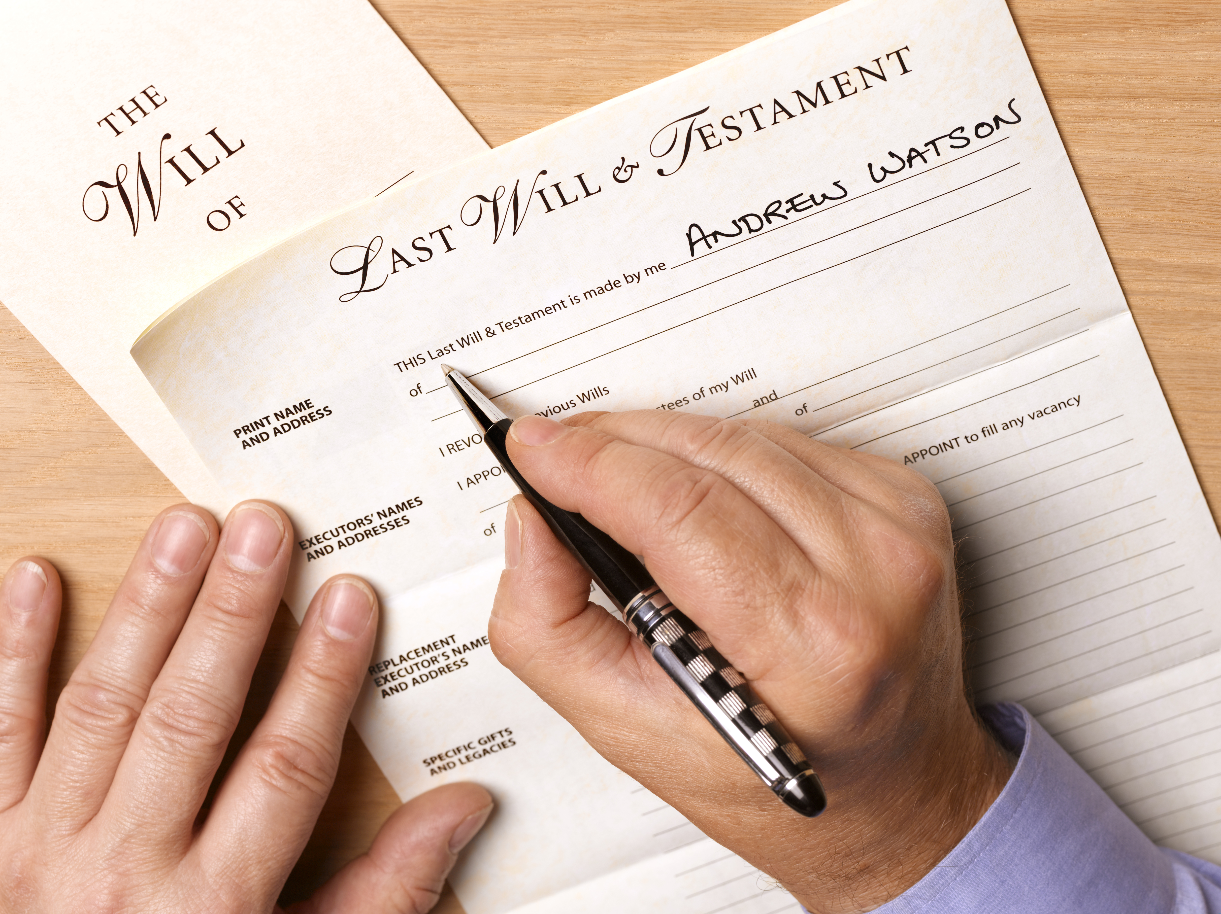 Mature man writing his will | Source: Getty Images